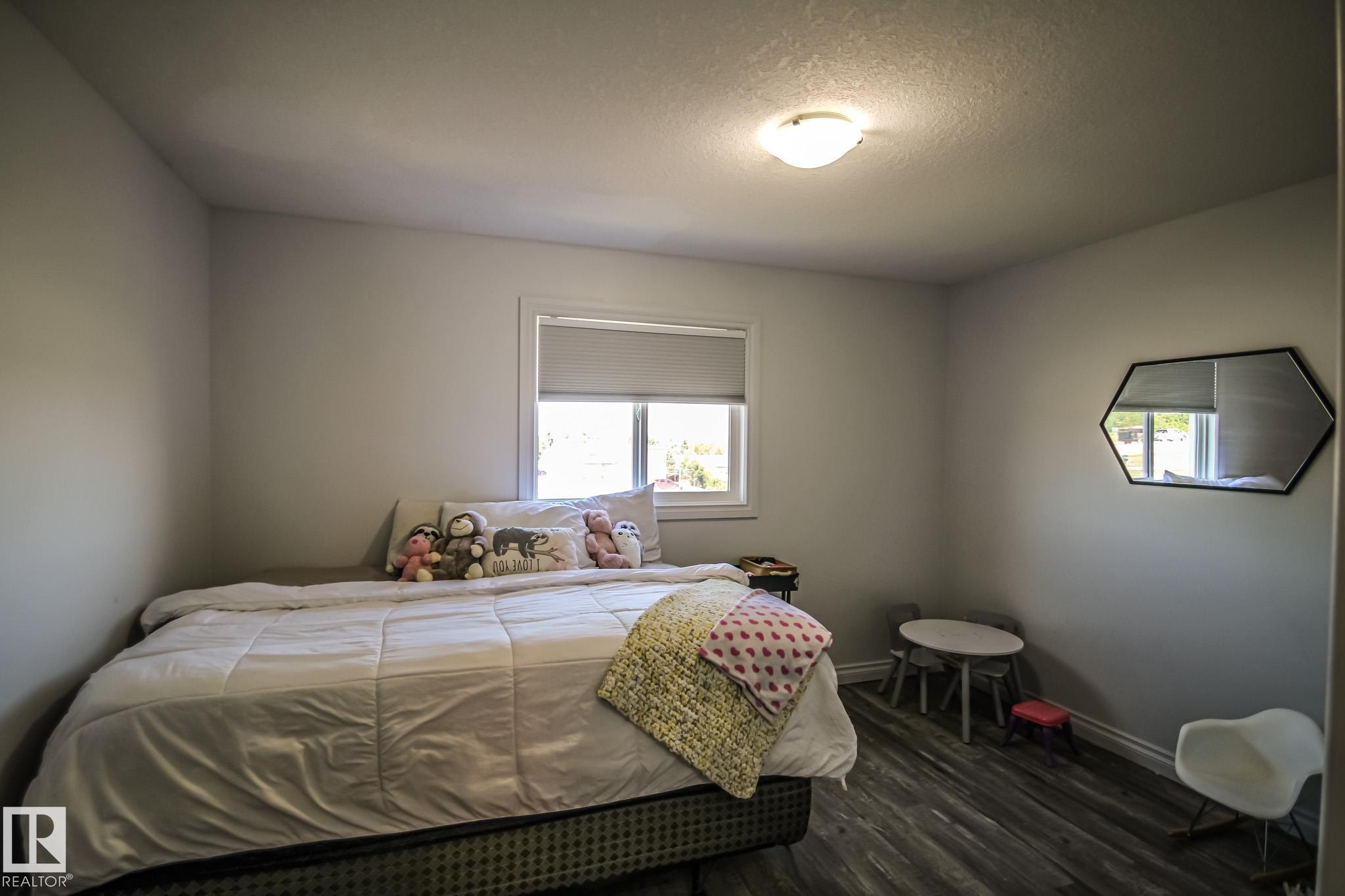 #2 1501 8 Ave, Cold Lake, AB - Indoor Photo Showing Bedroom