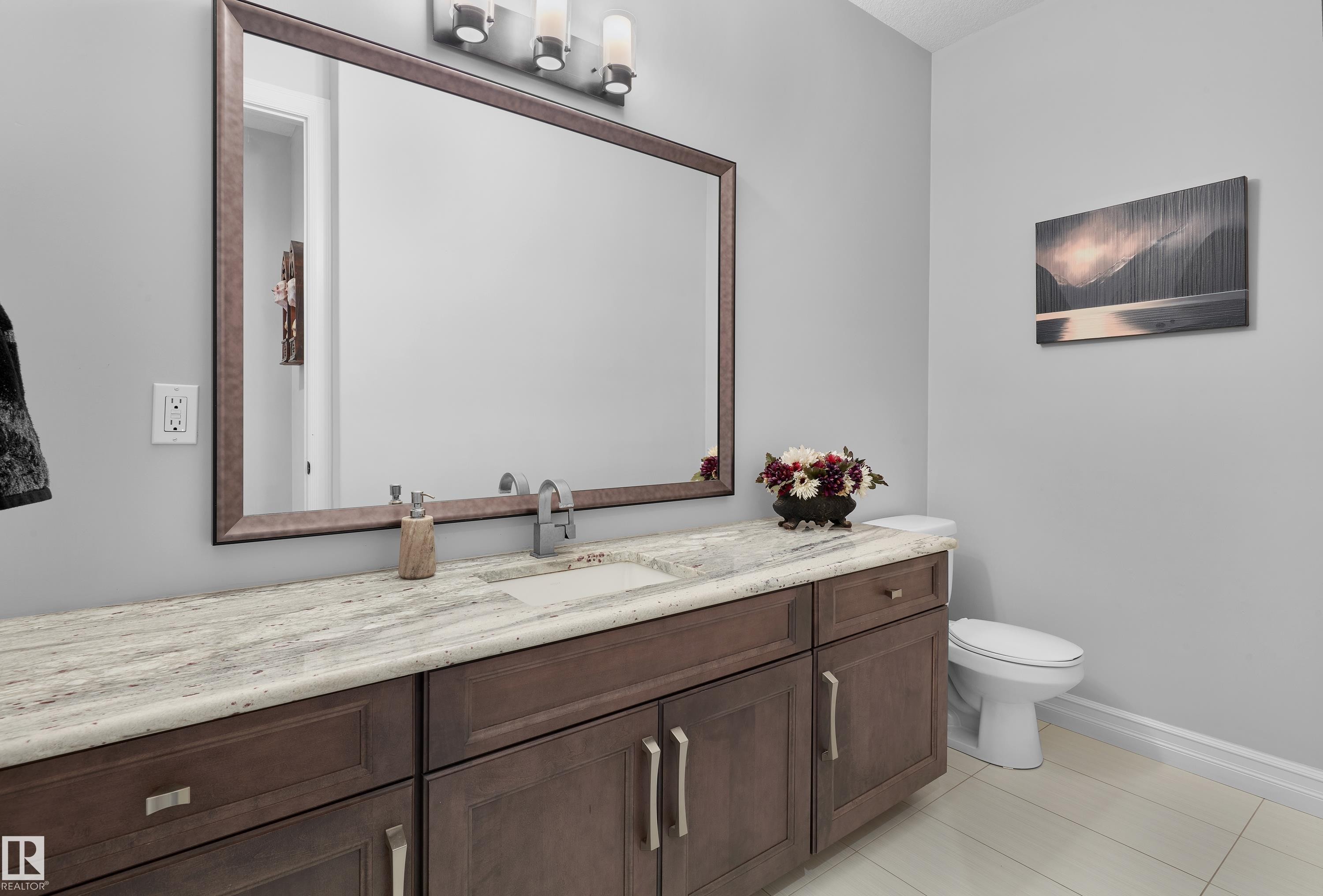Bathroom with vanity and tile patterned floors - 4111 Westcliff Heath Heath, Edmonton, AB - Indoor Photo Showing Bathroom