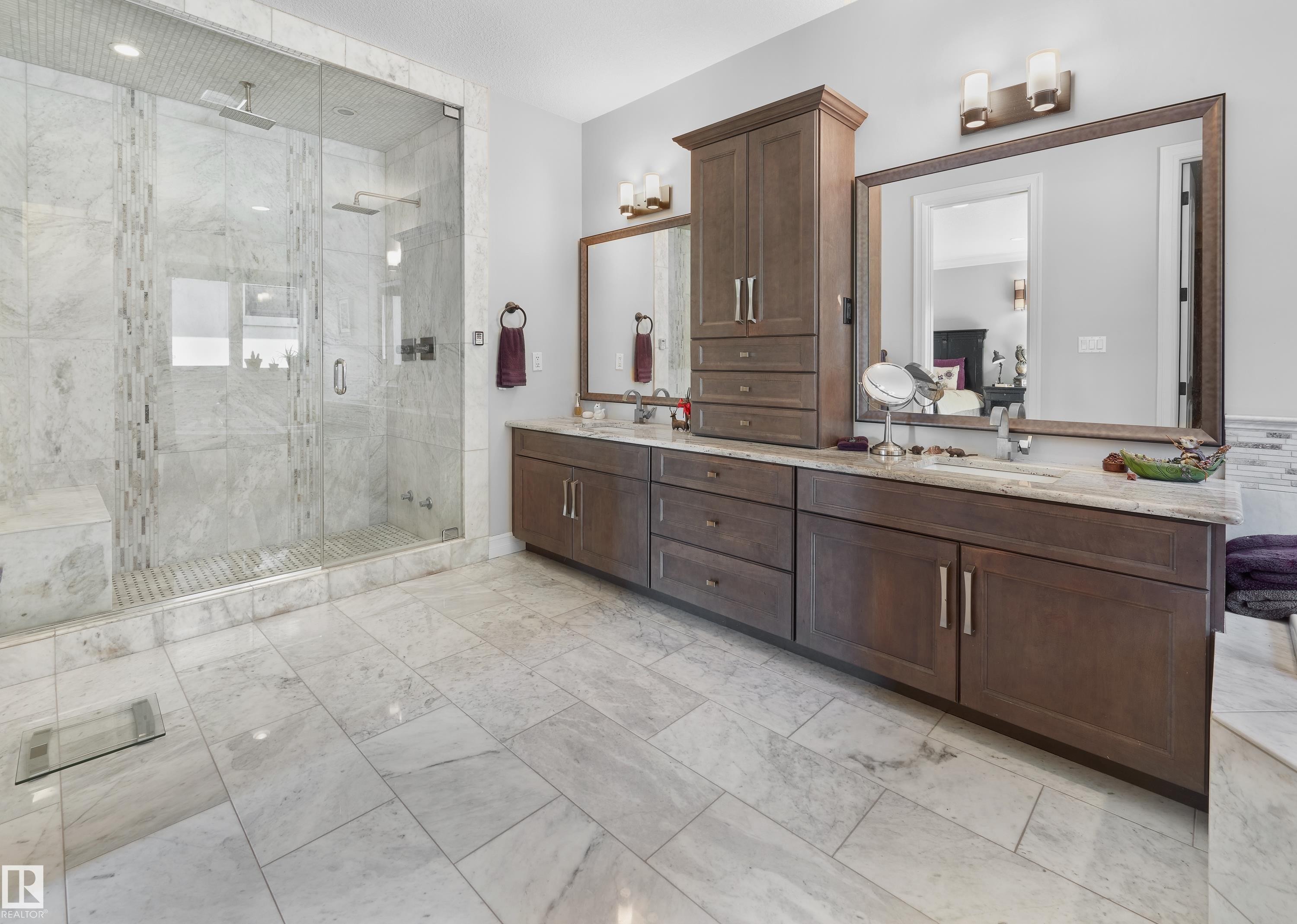 Full bath with double vanity, a shower stall, and marble finish floors - 4111 Westcliff Heath Heath, Edmonton, AB - Indoor Photo Showing Bathroom