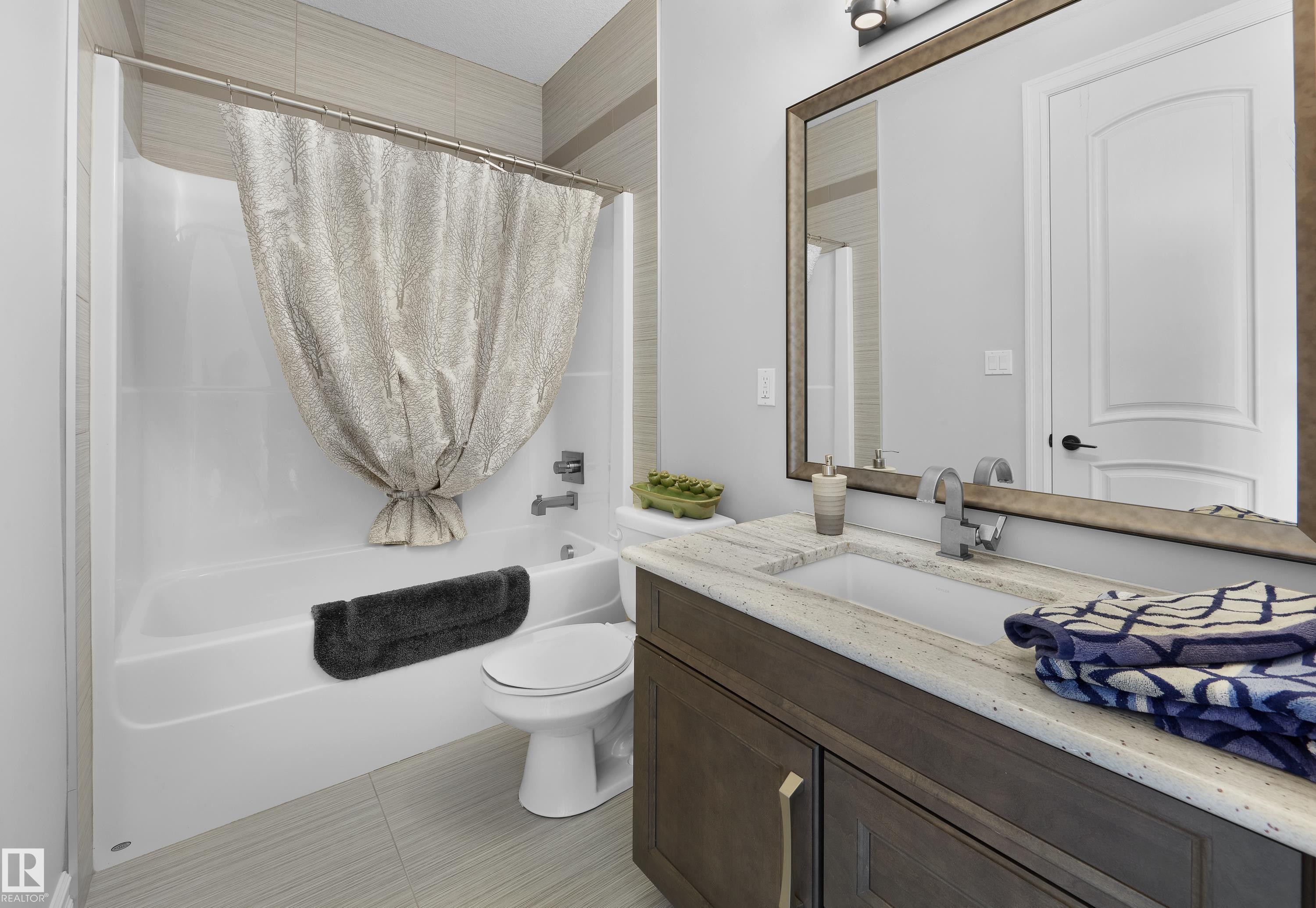 Bathroom with vanity and shower / tub combo with curtain - 4111 Westcliff Heath Heath, Edmonton, AB - Indoor Photo Showing Bathroom