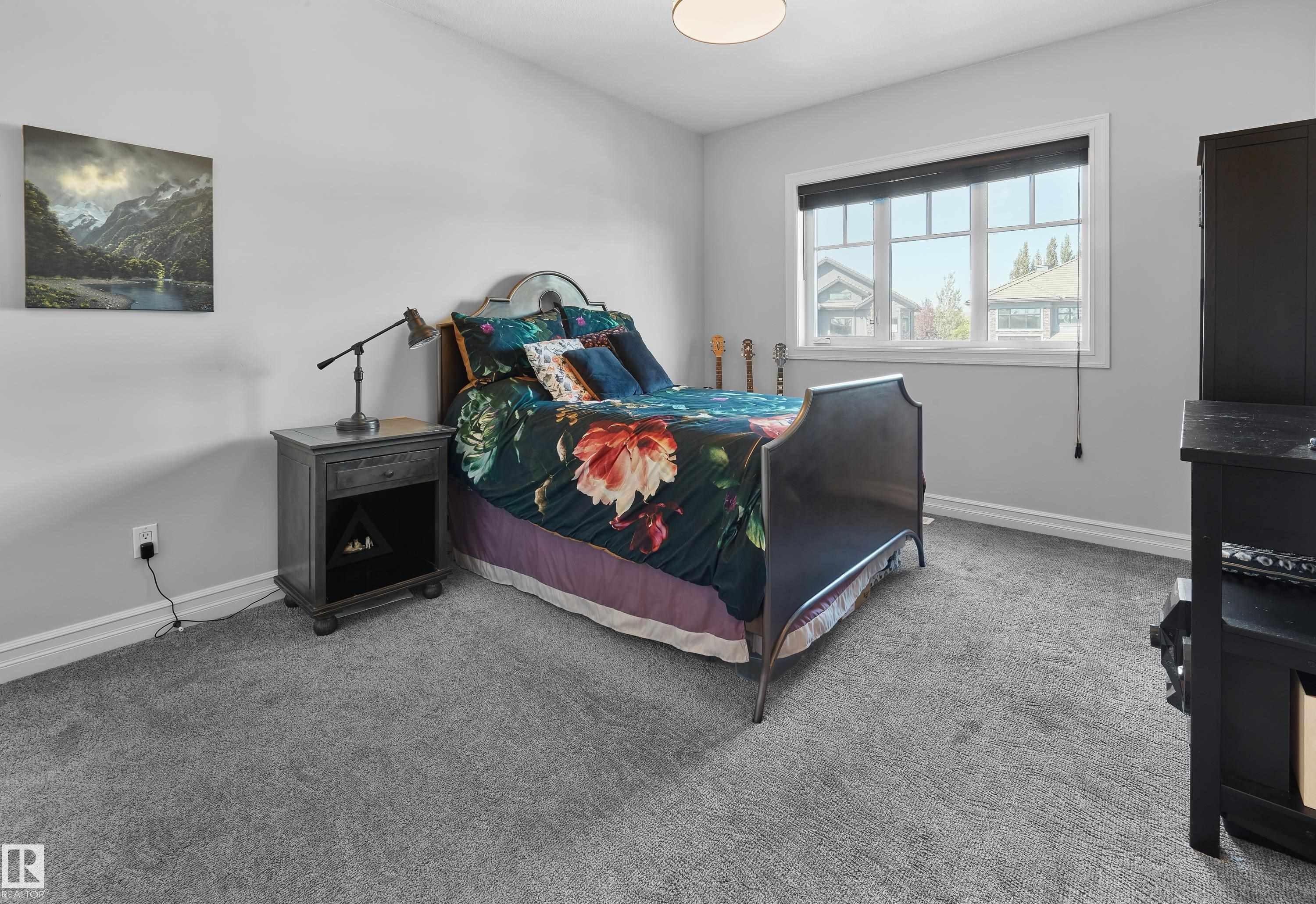 Carpeted bedroom featuring baseboards - 4111 Westcliff Heath Heath, Edmonton, AB - Indoor Photo Showing Bedroom