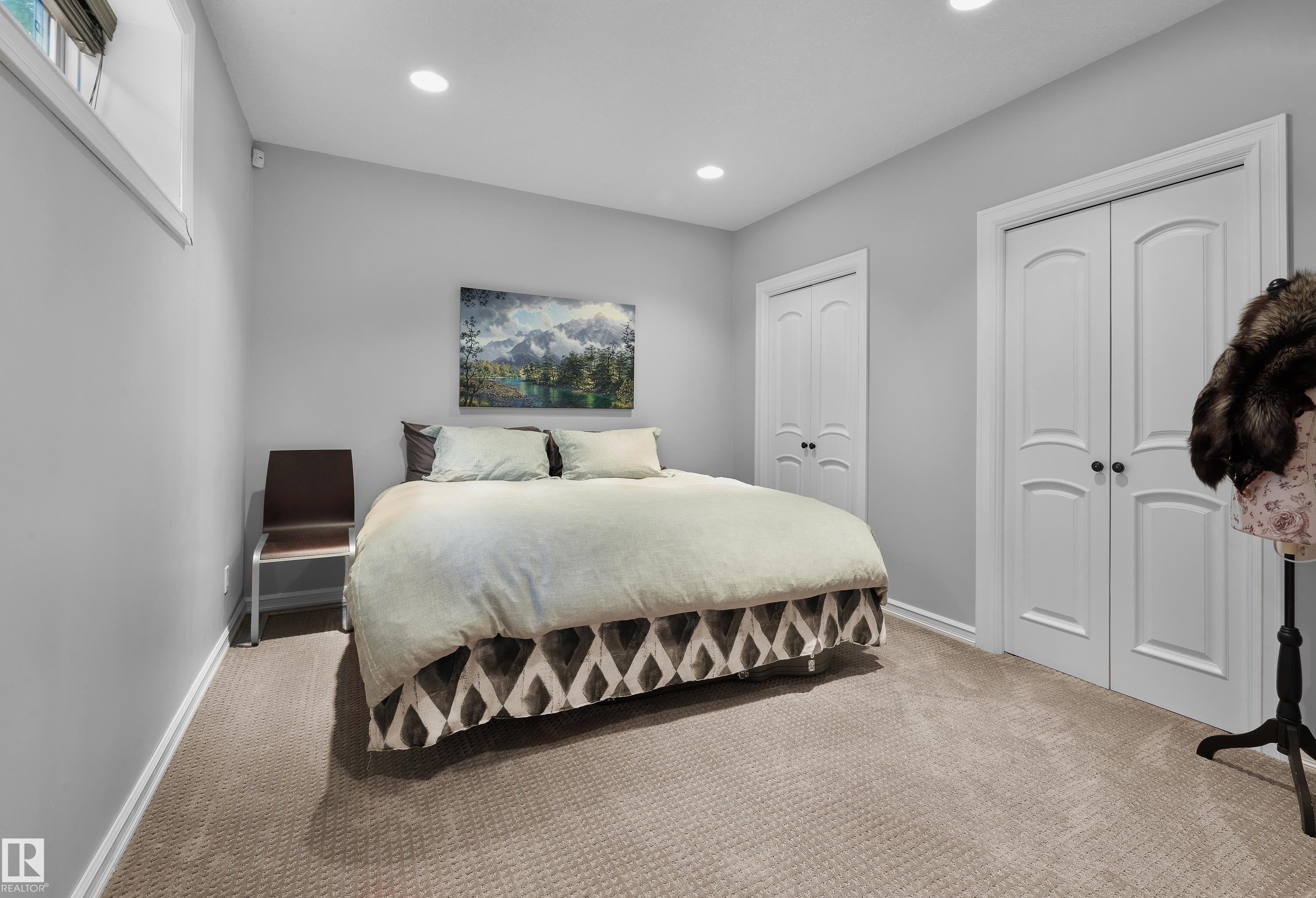 Carpeted bedroom with two closets and recessed lighting - 4111 Westcliff Heath Heath, Edmonton, AB - Indoor Photo Showing Bedroom
