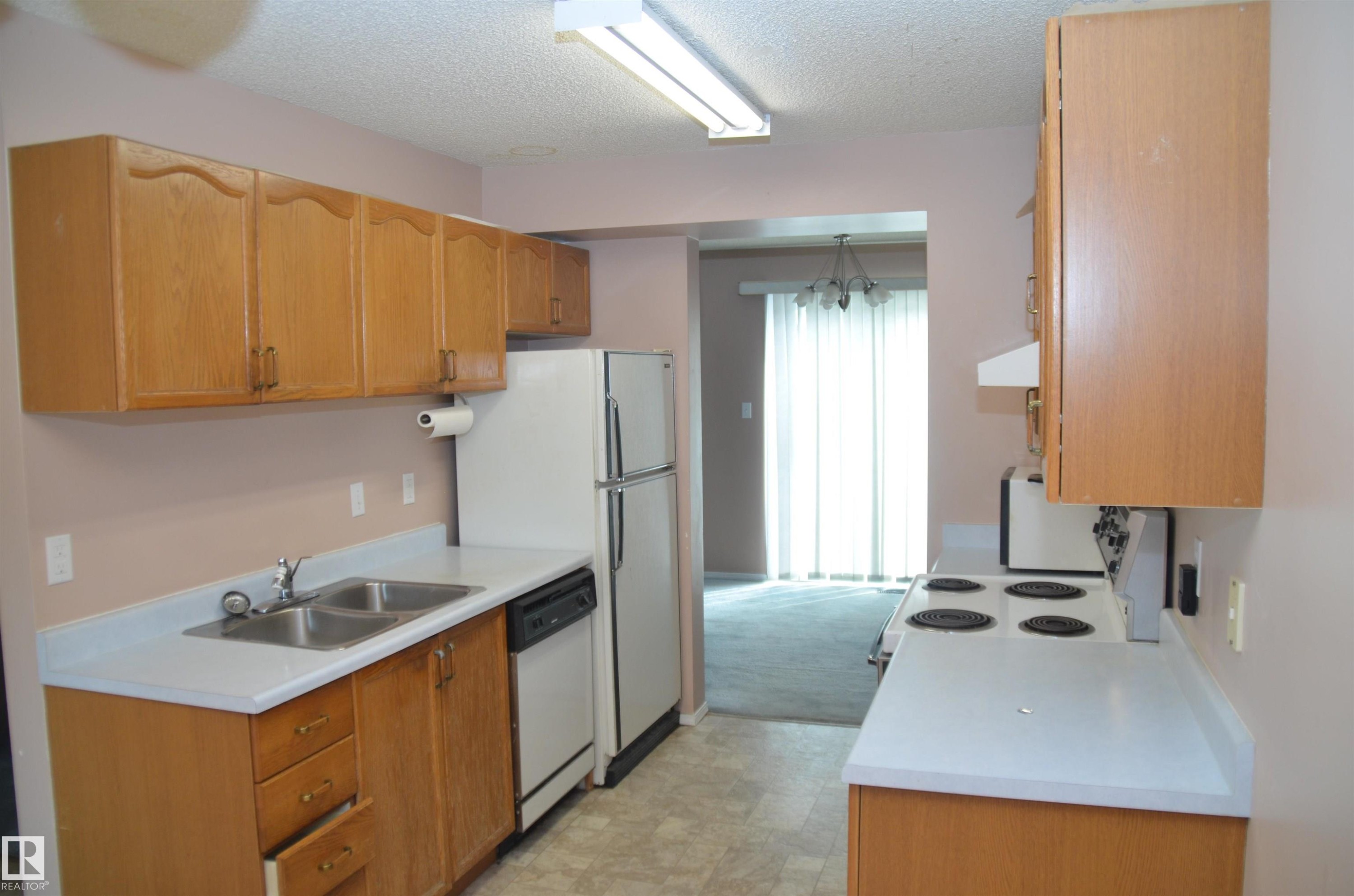 Edmonton, AB - Indoor Photo Showing Kitchen With Double Sink