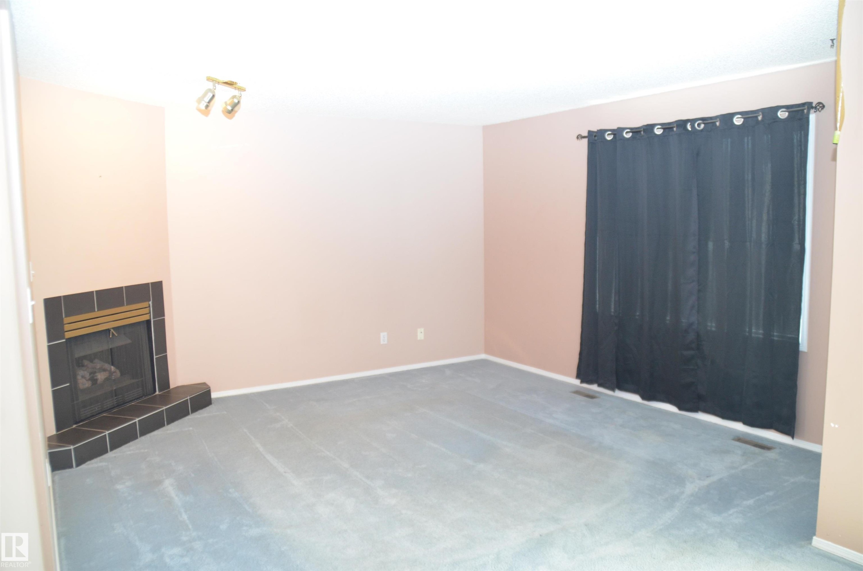 Edmonton, AB - Indoor Photo Showing Other Room With Fireplace