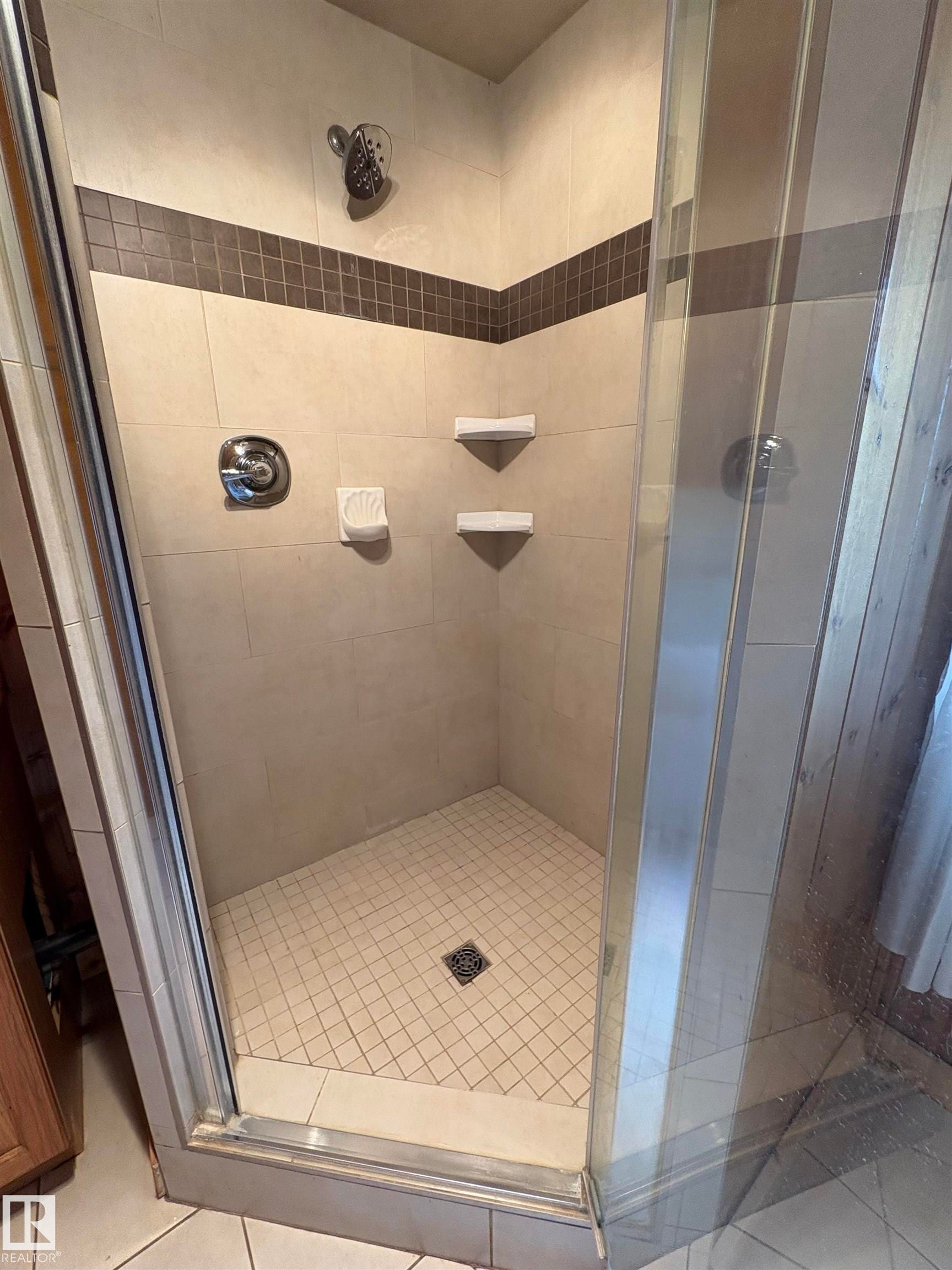 Bathroom with a shower stall - B58018 Hiway 29, Rural St. Paul County, AB - Indoor Photo Showing Bathroom
