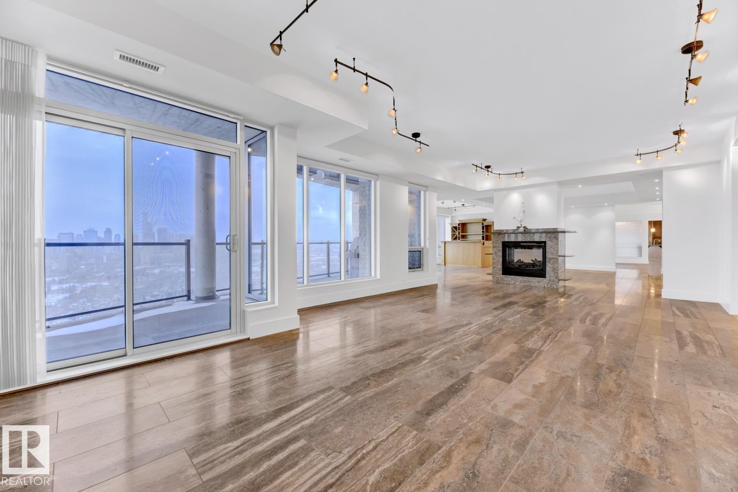 1900 10035 Saskatchewan Drive, Edmonton, AB - Indoor With Fireplace