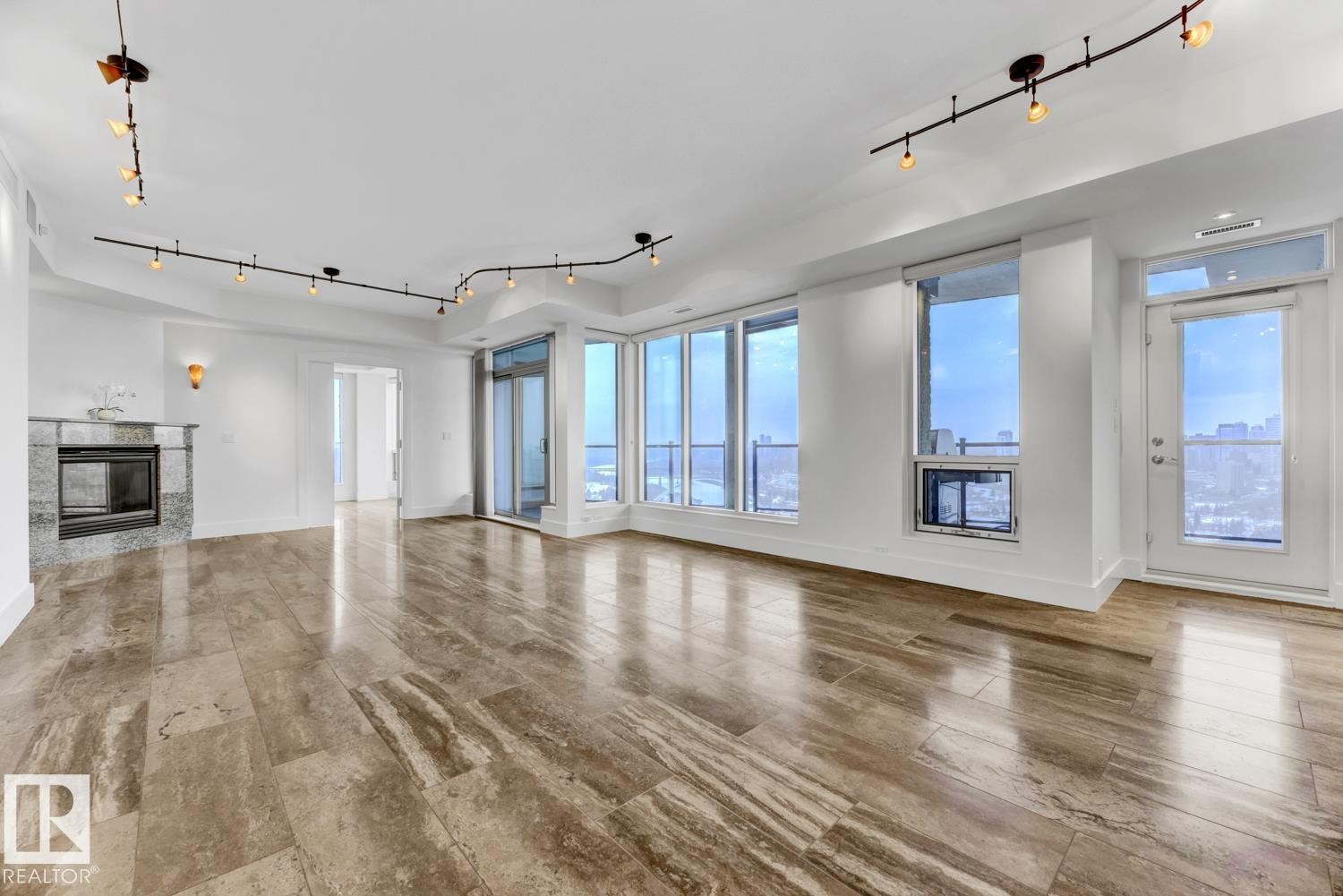 1900 10035 Saskatchewan Drive, Edmonton, AB - Indoor Photo Showing Other Room With Fireplace