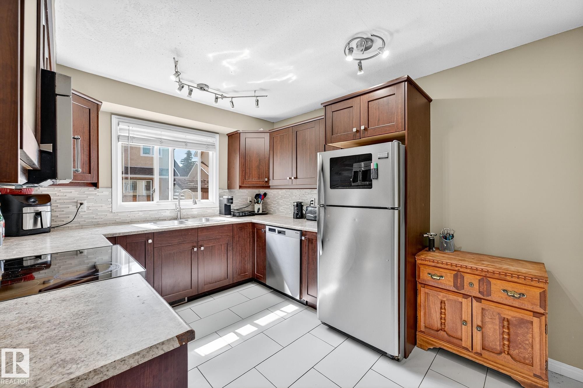 11005 162A Avenue, Edmonton, AB - Indoor Photo Showing Kitchen With Stainless Steel Kitchen With Double Sink