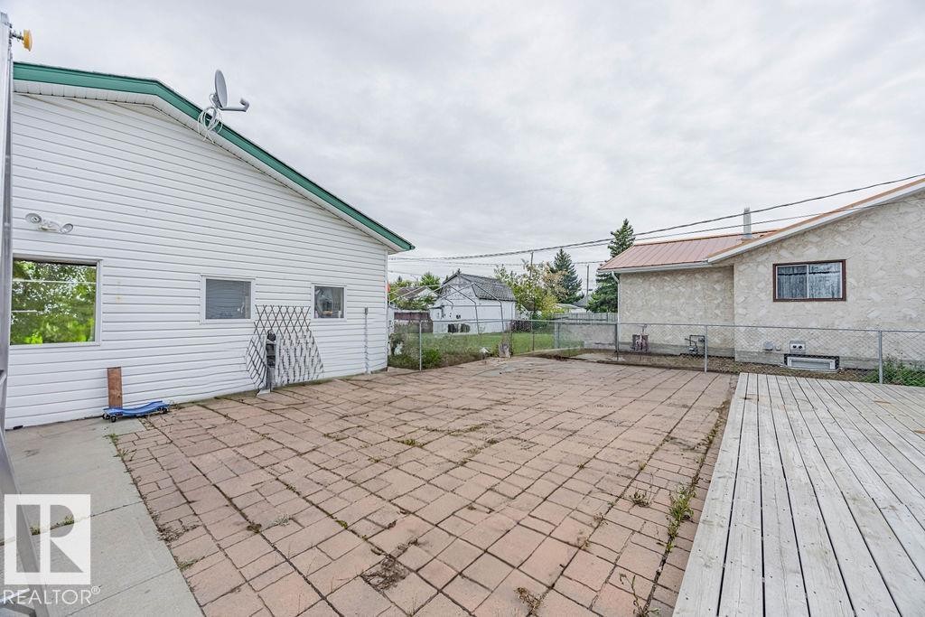 View of patio featuring a wooden deck - 5026 53 Ave, Ryley, AB - Outdoor With Exterior