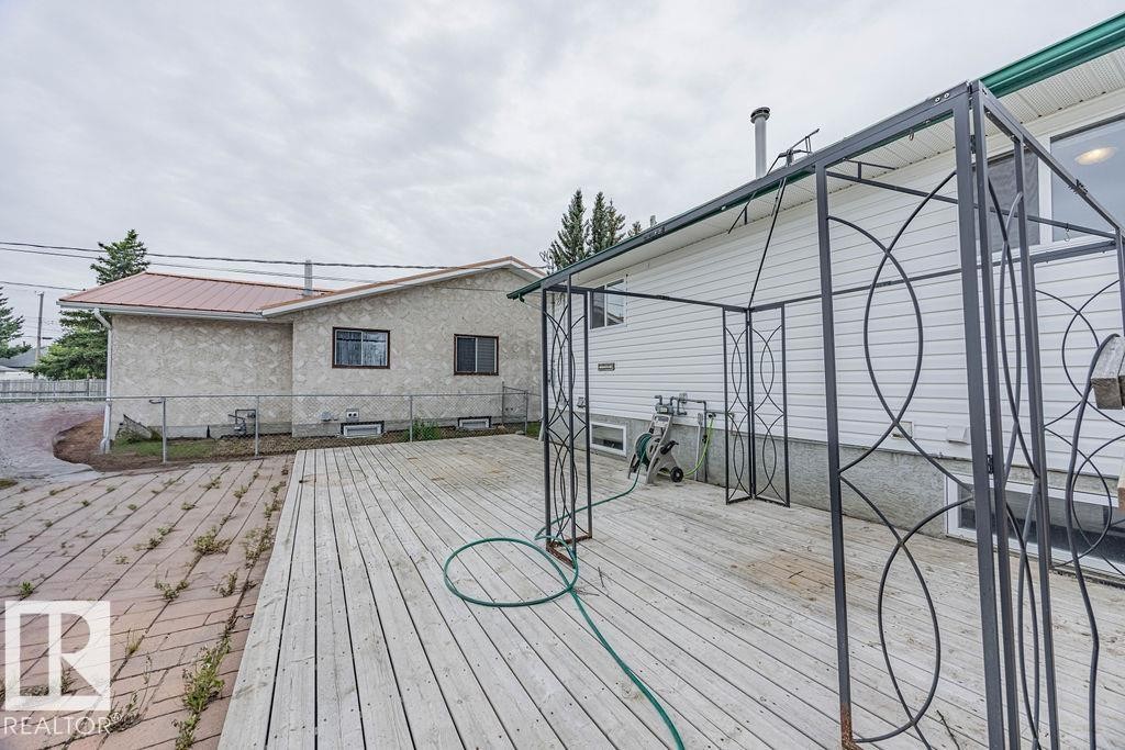 View of wooden deck - 5026 53 Ave, Ryley, AB - Outdoor With Deck Patio Veranda