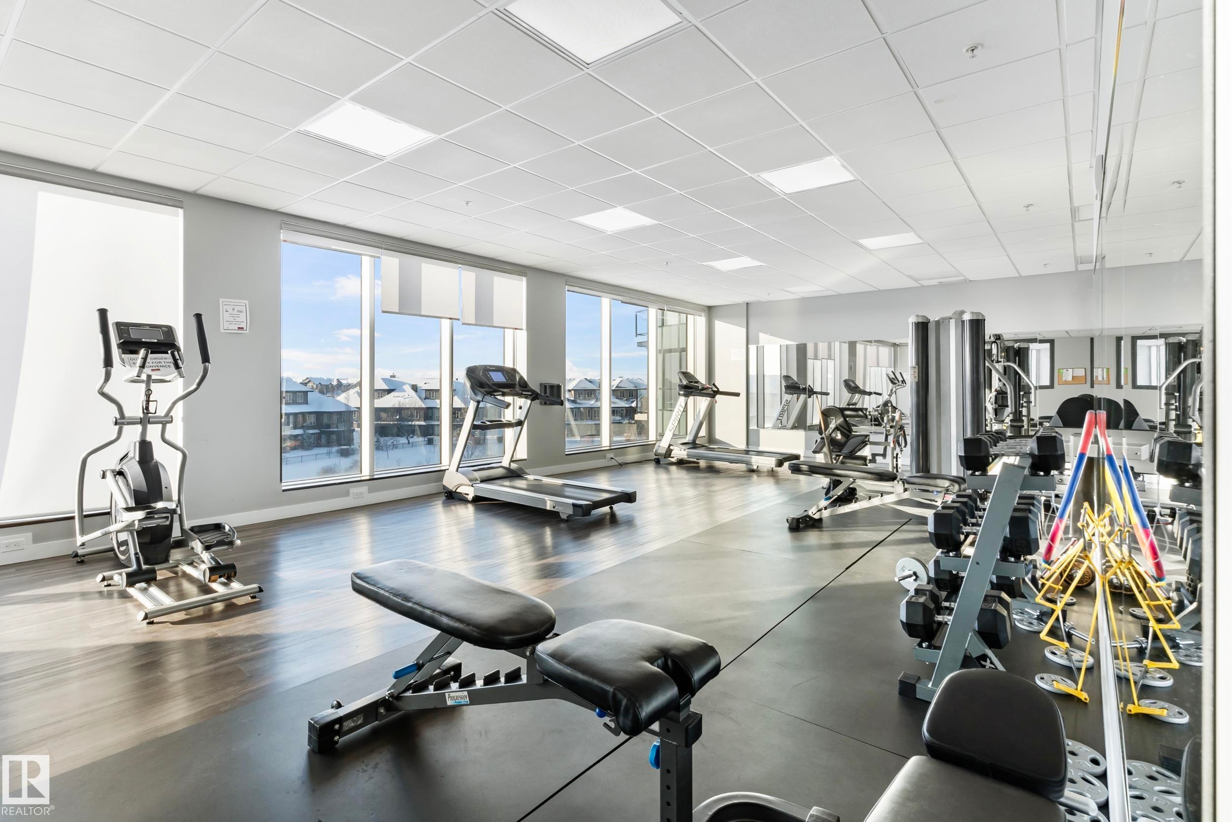 810 5151 Windermere Boulevard, Edmonton, AB - Indoor Photo Showing Gym Room