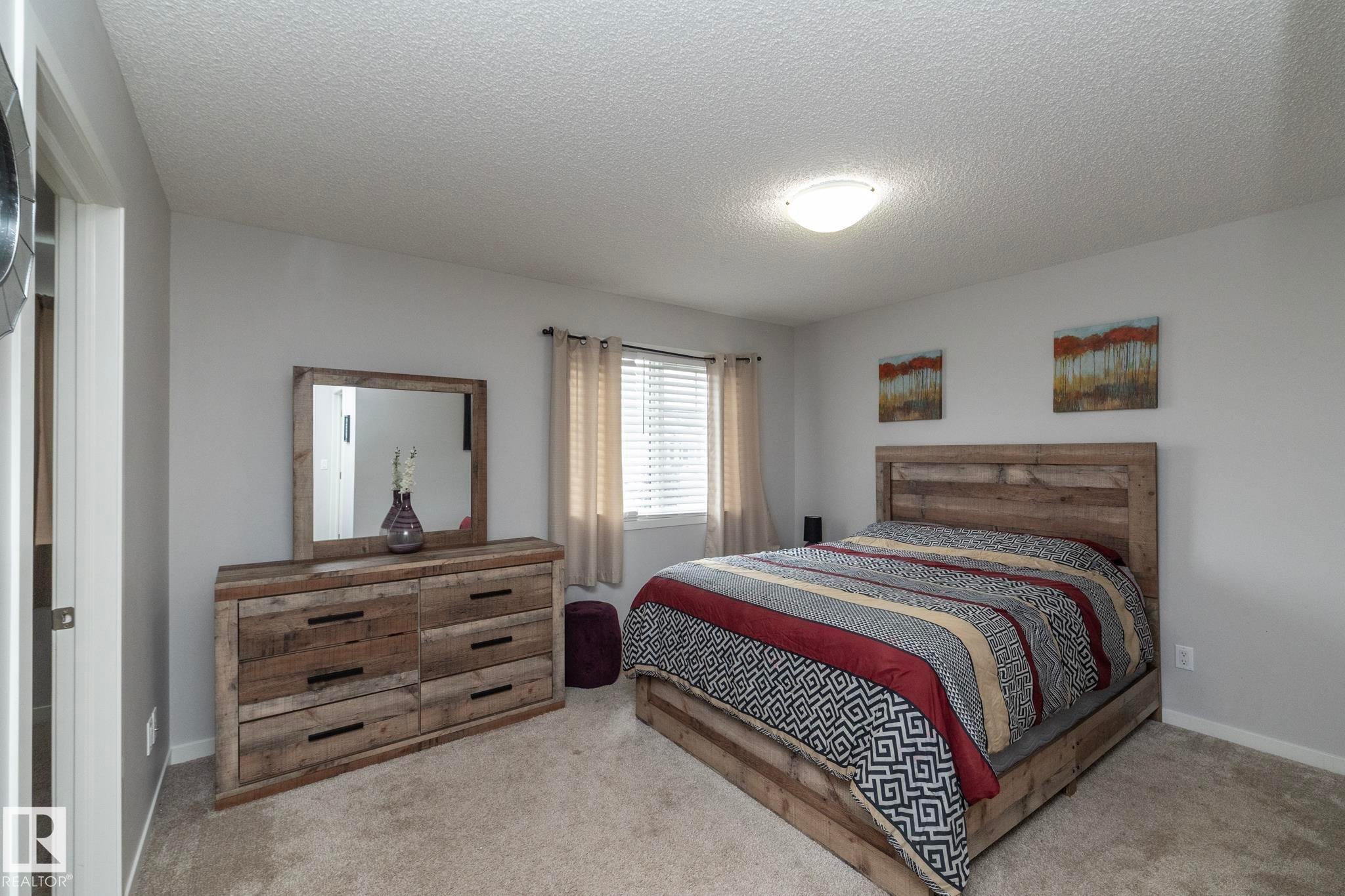 7712 Eifert Crescent, Edmonton, AB - Indoor Photo Showing Bedroom