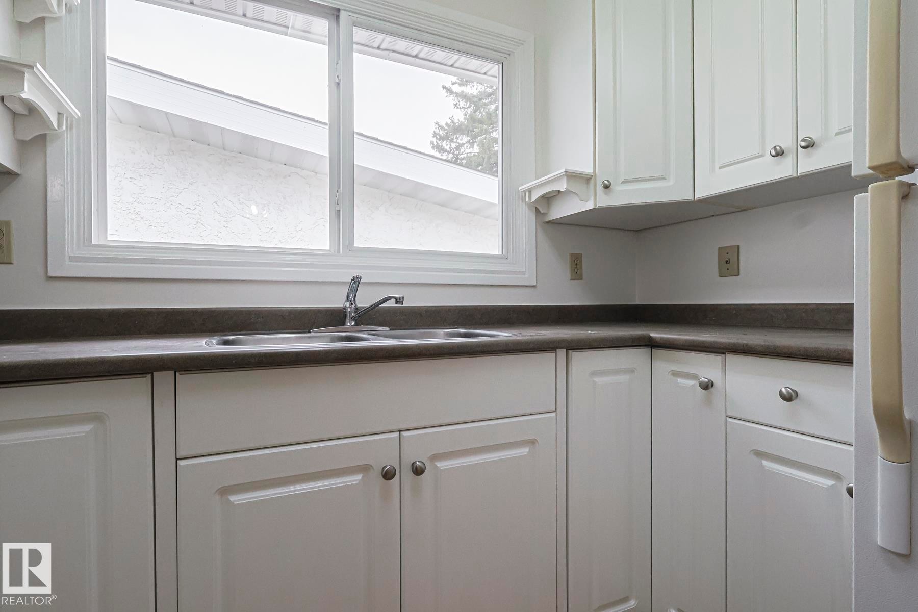 Edmonton, AB - Indoor Photo Showing Kitchen With Double Sink
