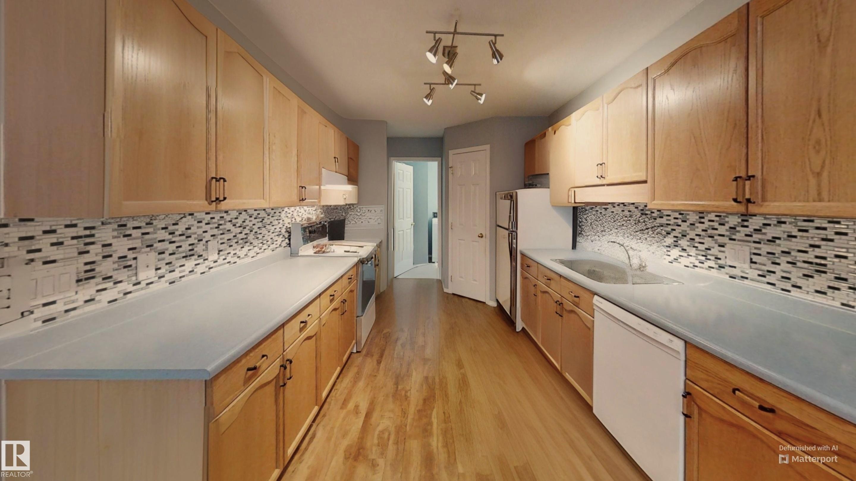 208 Ravine Villa(S), Leduc, AB - Indoor Photo Showing Kitchen
