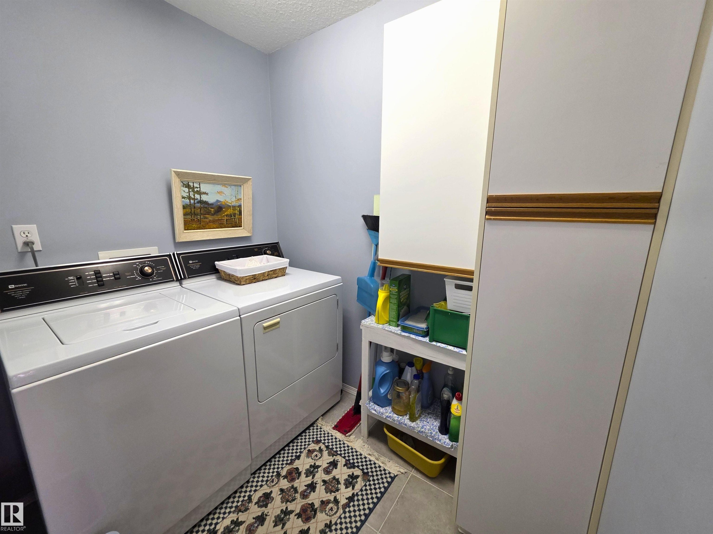 208 Ravine Villa(S), Leduc, AB - Indoor Photo Showing Laundry Room