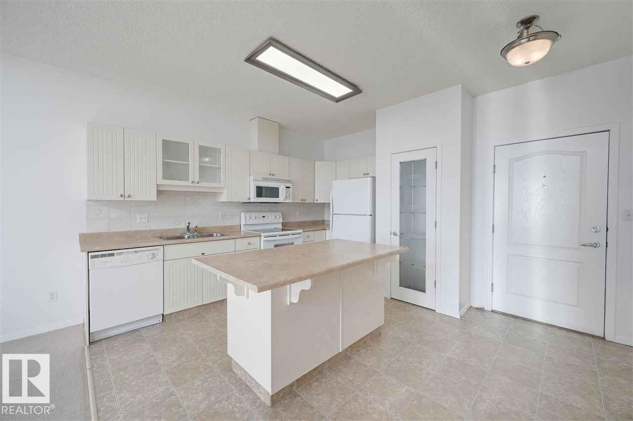 Edmonton, AB - Indoor Photo Showing Kitchen With Double Sink