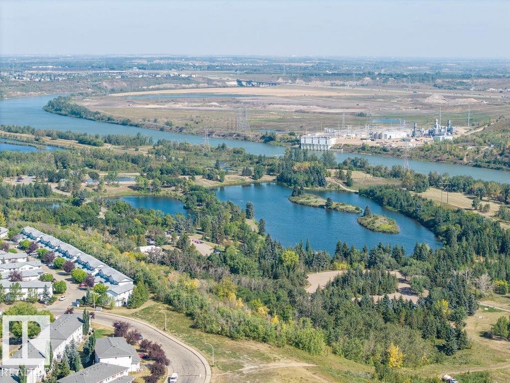Aerial view of property's location with a nearby body of water - Edmonton, AB - Outdoor With Body Of Water With View