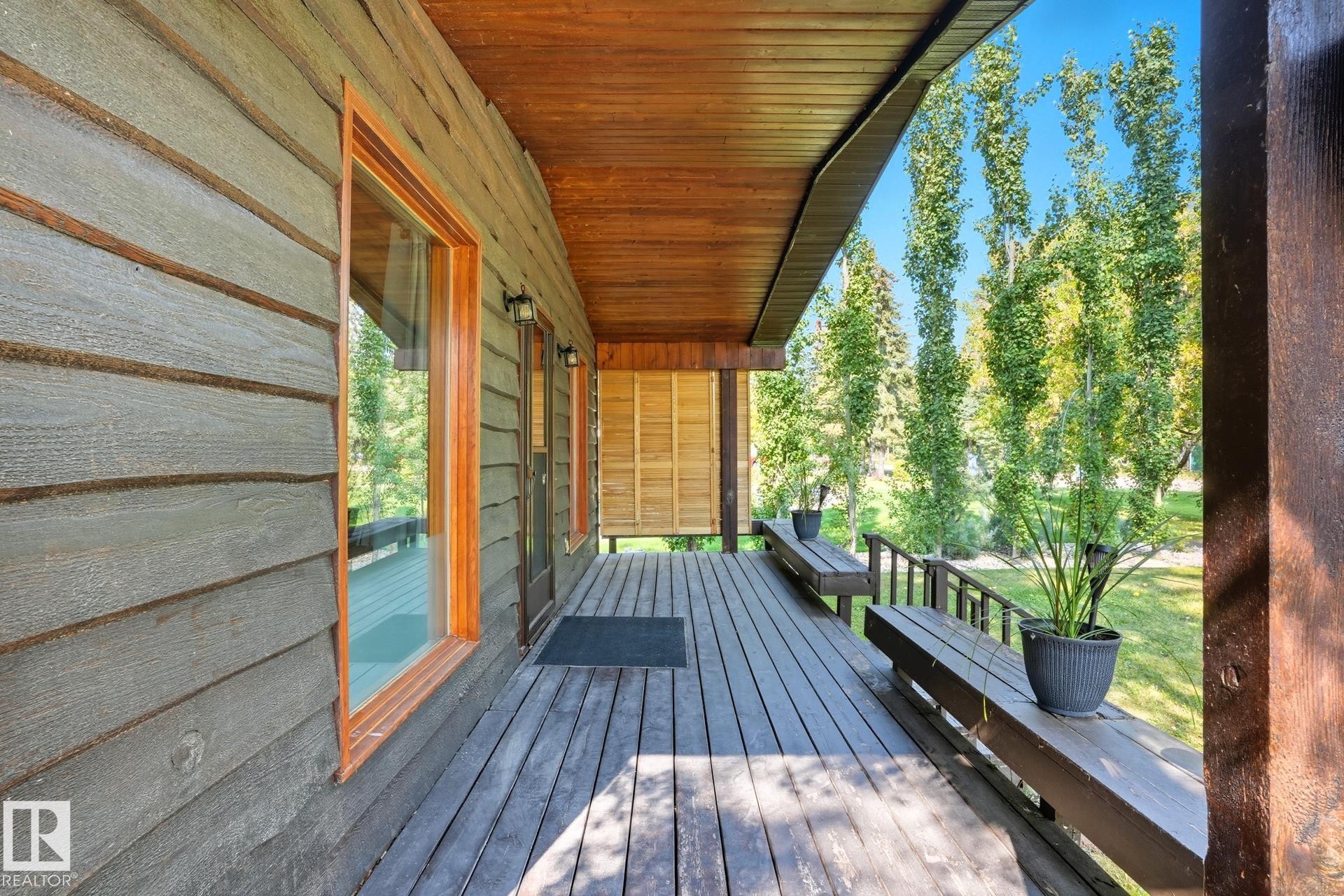 View of wooden terrace - 6309 49 St, Rural Wetaskiwin County, AB - Outdoor With Deck Patio Veranda With Exterior