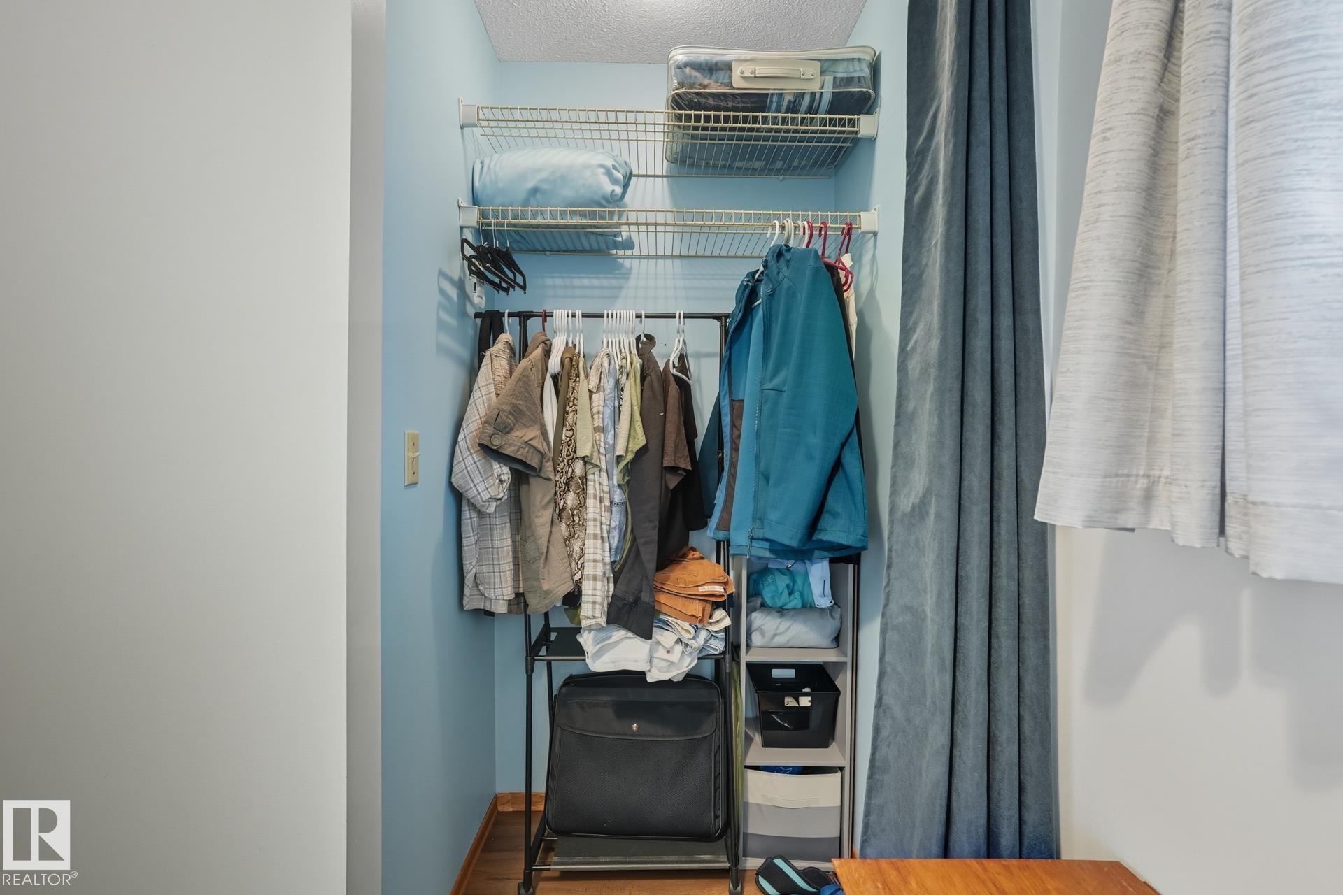 View of closet - 6309 49 St, Rural Wetaskiwin County, AB - Indoor