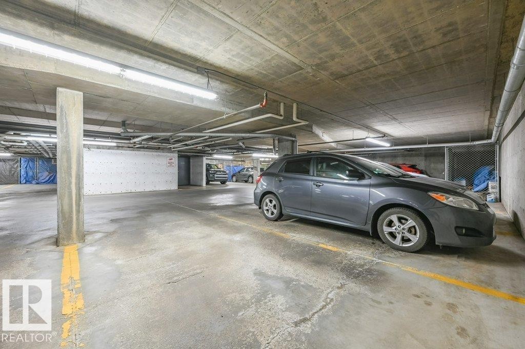 View of parking garage - 140 308 Ambleside Link, Edmonton, AB - Indoor Photo Showing Garage