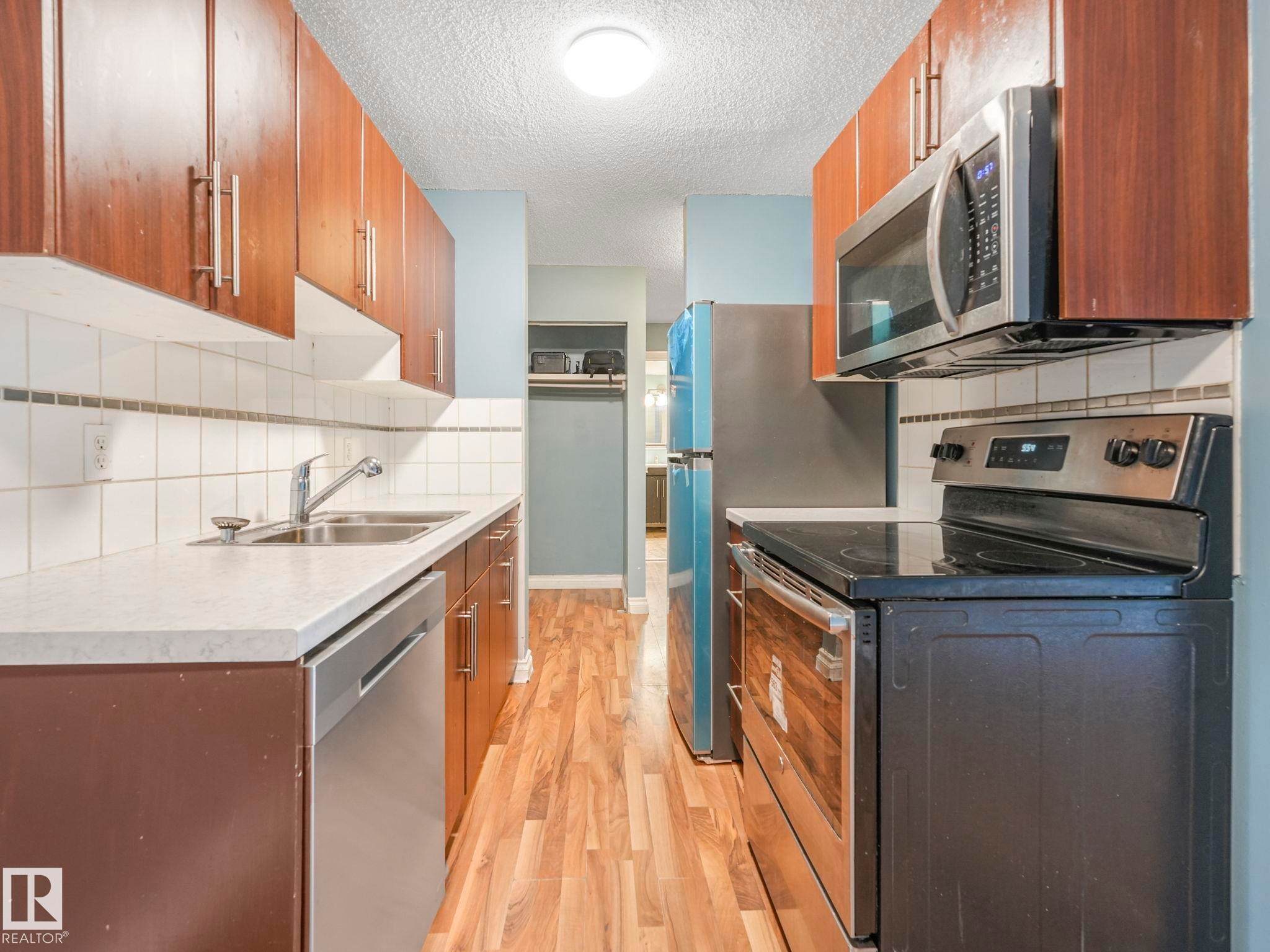 205 12223 82 Street, Edmonton, AB - Indoor Photo Showing Kitchen With Double Sink