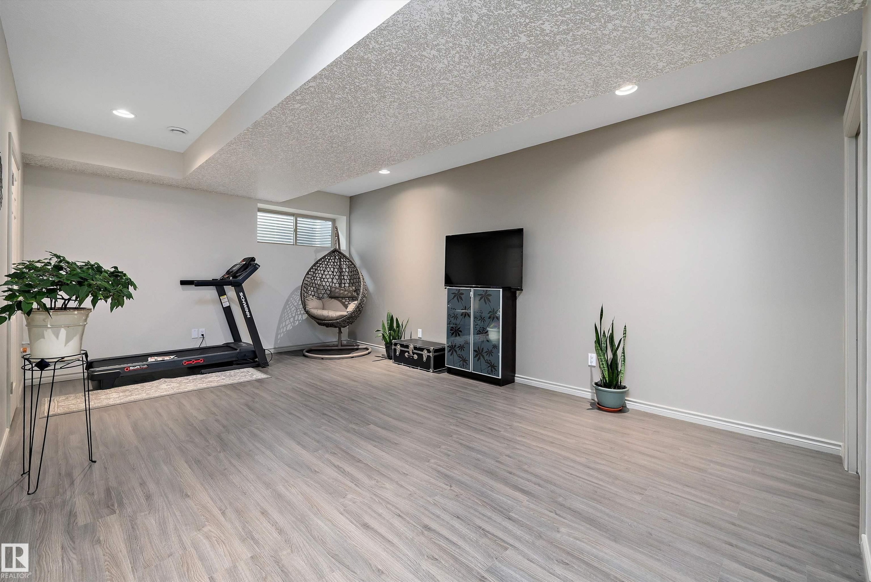 135 Gilmore Way, Spruce Grove, AB - Indoor Photo Showing Gym Room