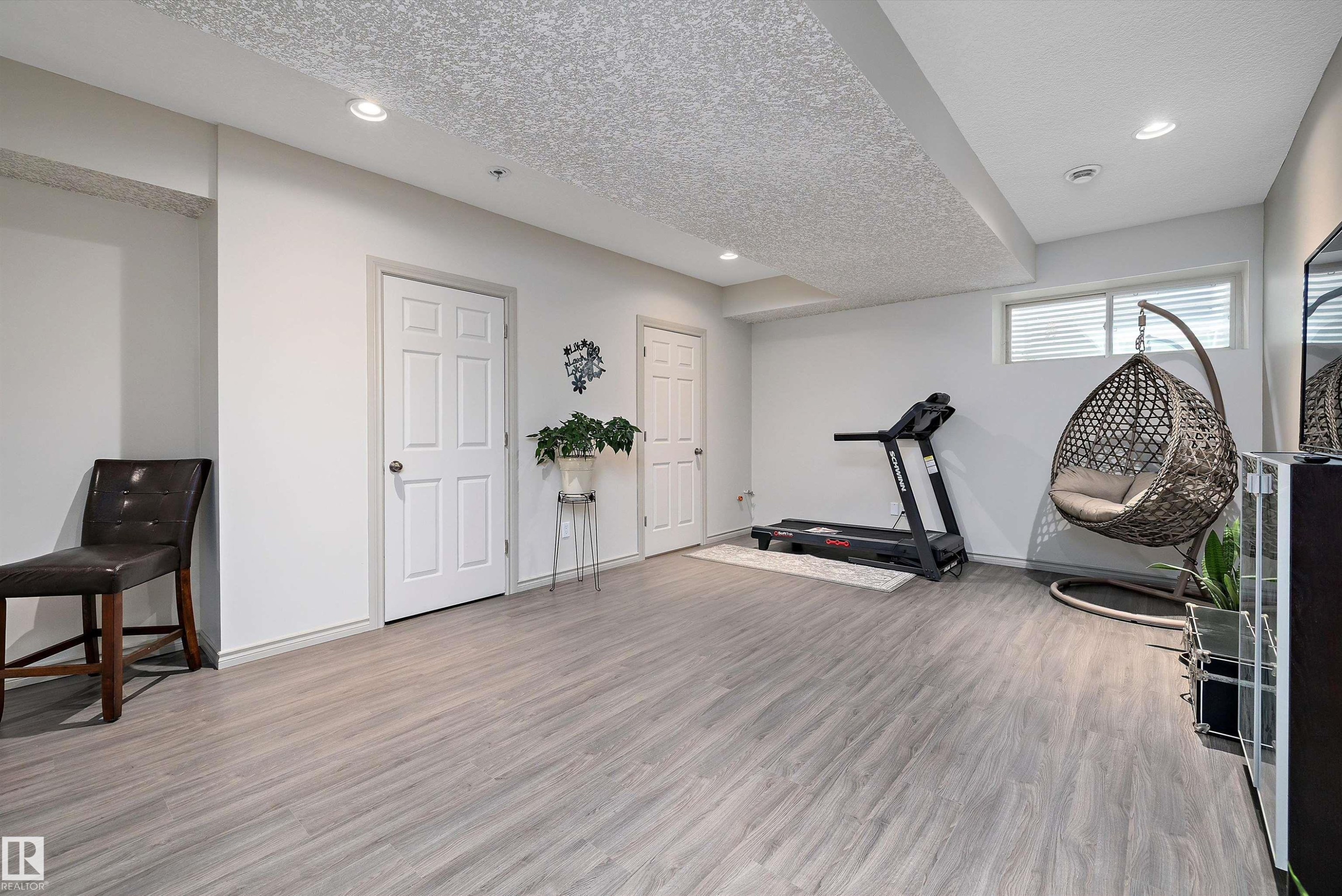 135 Gilmore Way, Spruce Grove, AB - Indoor Photo Showing Gym Room