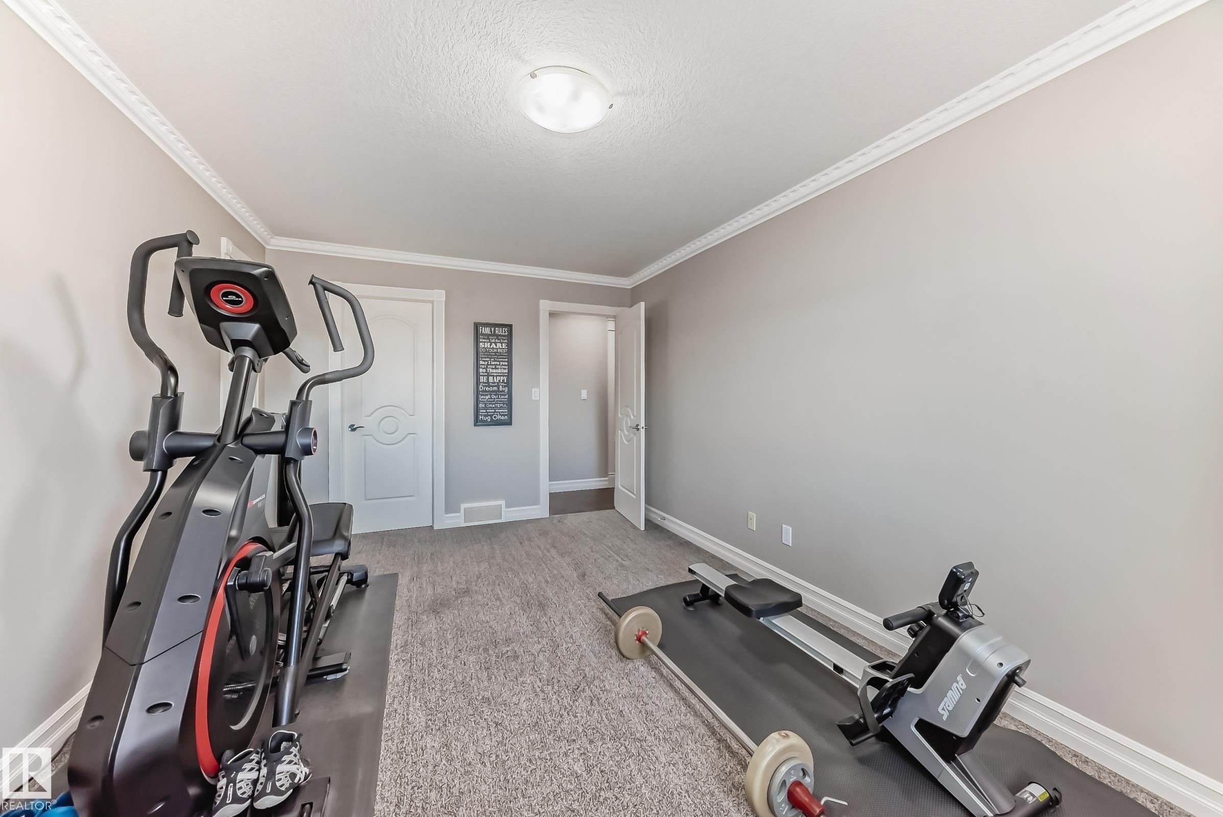 Edmonton, AB - Indoor Photo Showing Gym Room