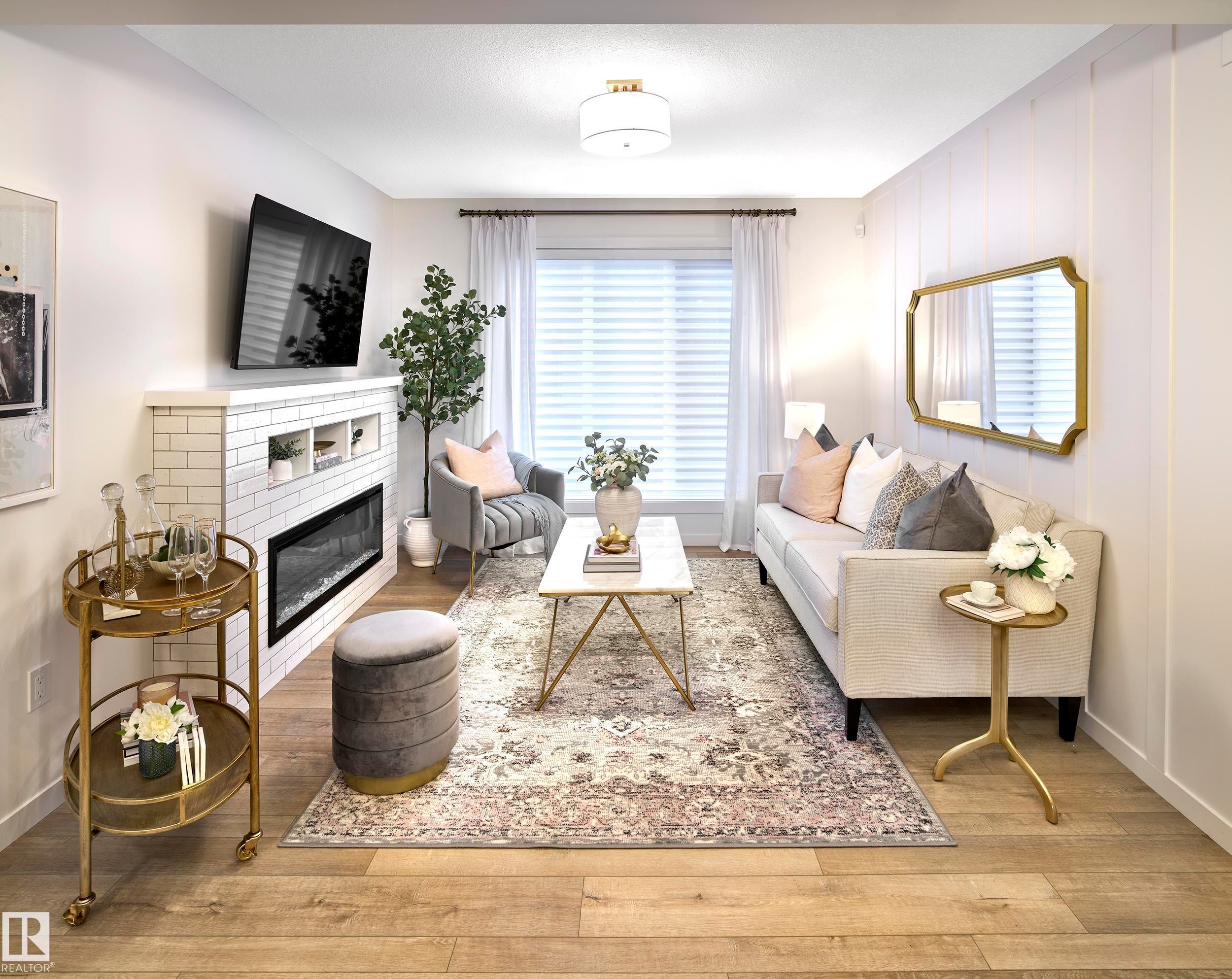 37 1025 Secord Promenade, Edmonton, AB - Indoor Photo Showing Living Room With Fireplace
