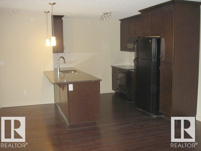 437 6076 Schonsee Way, Edmonton, AB - Indoor Photo Showing Kitchen