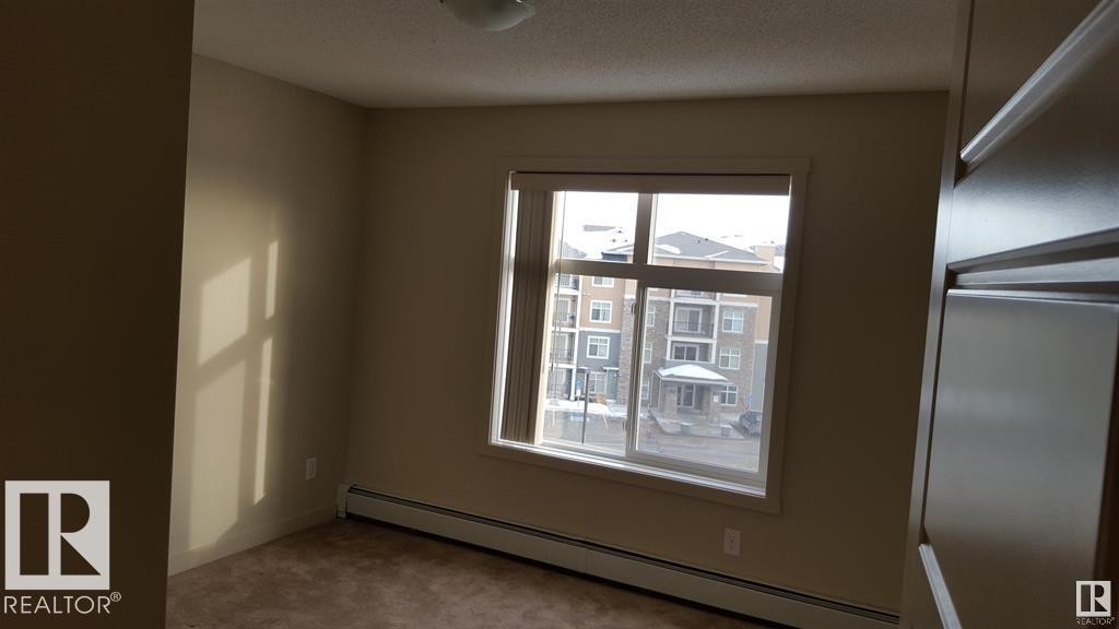 437 6076 Schonsee Way, Edmonton, AB - Indoor Photo Showing Other Room