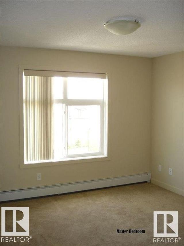 437 6076 Schonsee Way, Edmonton, AB - Indoor Photo Showing Other Room