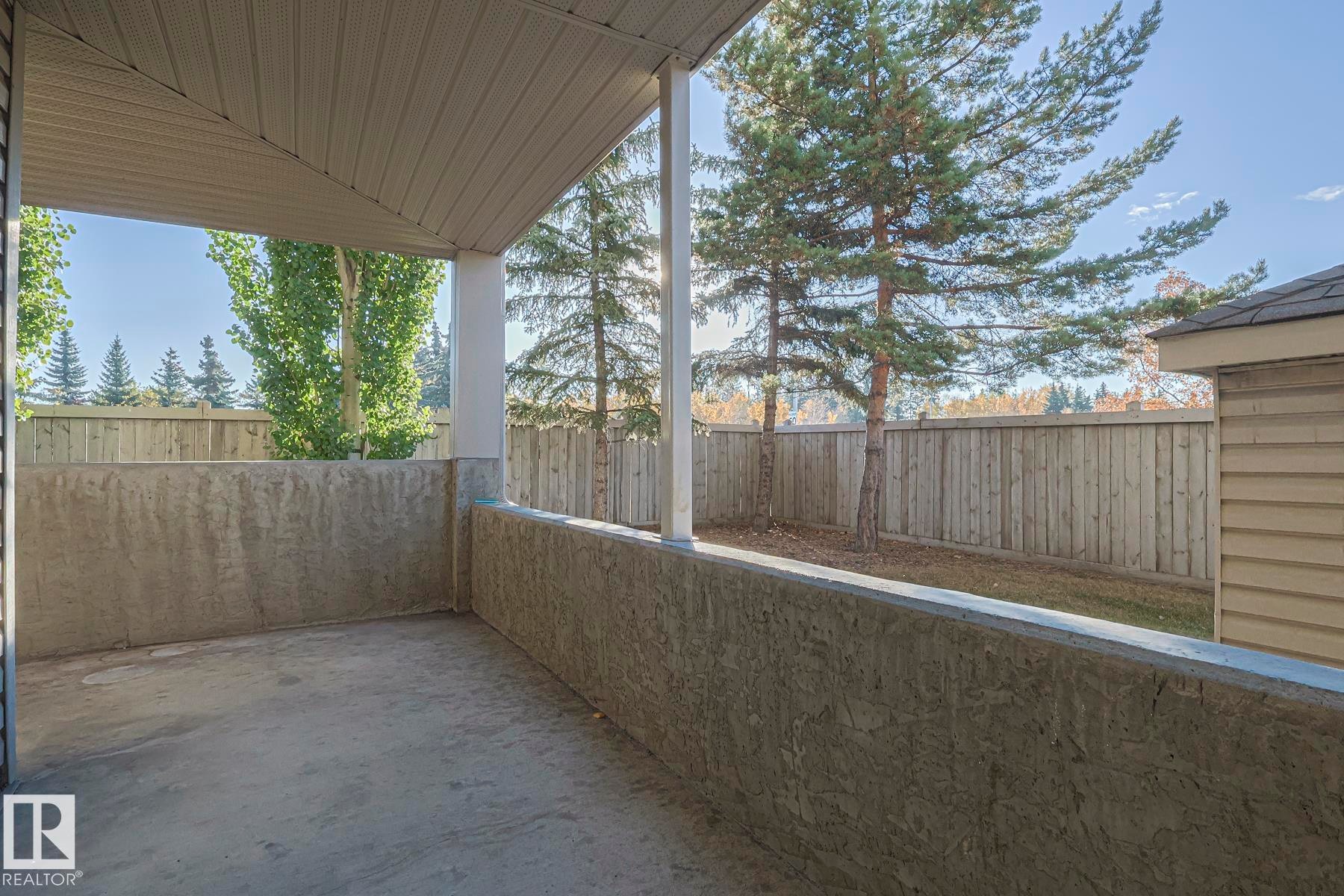 Fenced backyard with a patio - 120 7511 171 Street Nw, Edmonton, AB - Outdoor