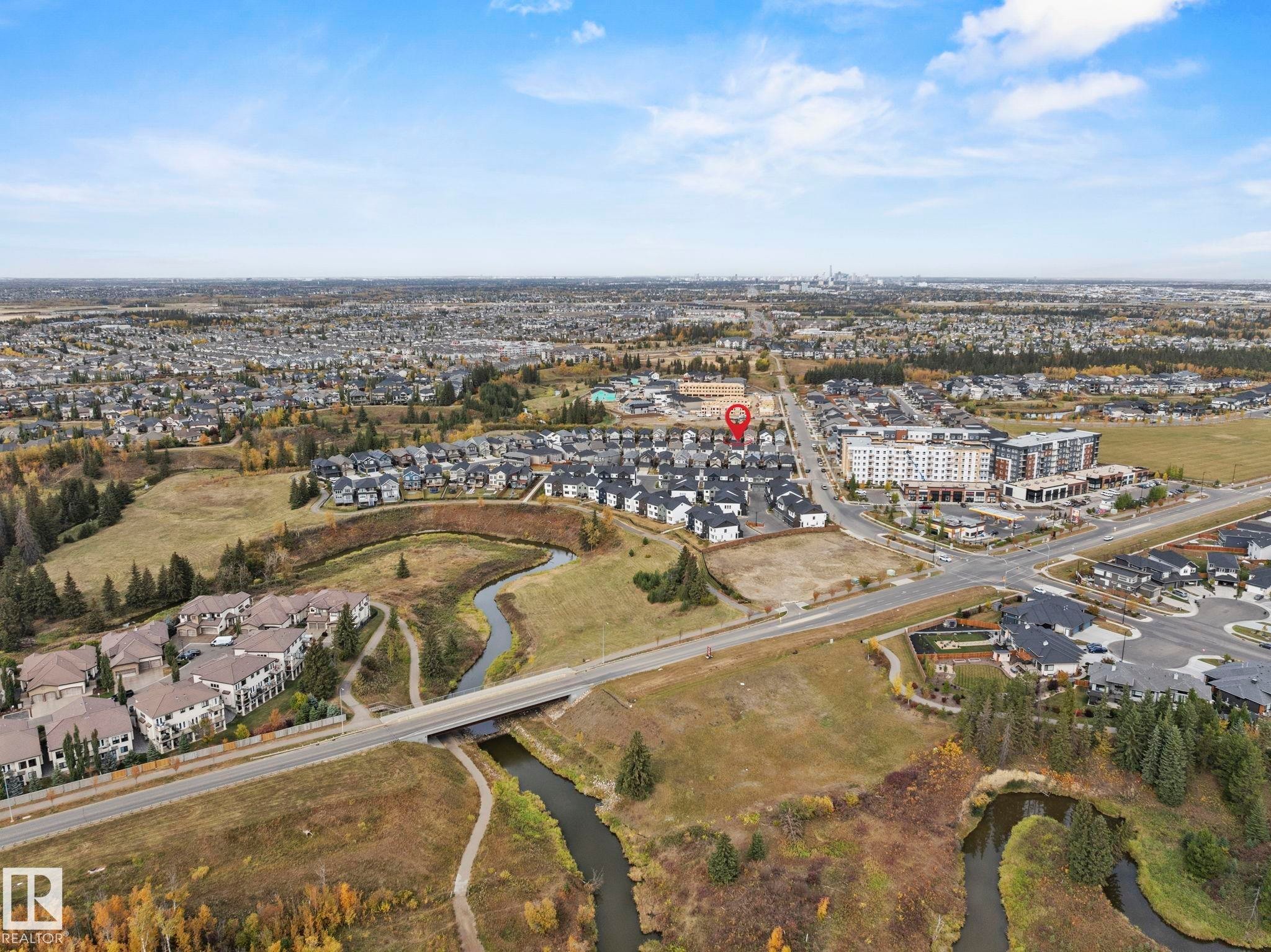 Aerial view of property's location featuring nearby suburban area - 1813 Collip View View, Edmonton, AB - Outdoor With View