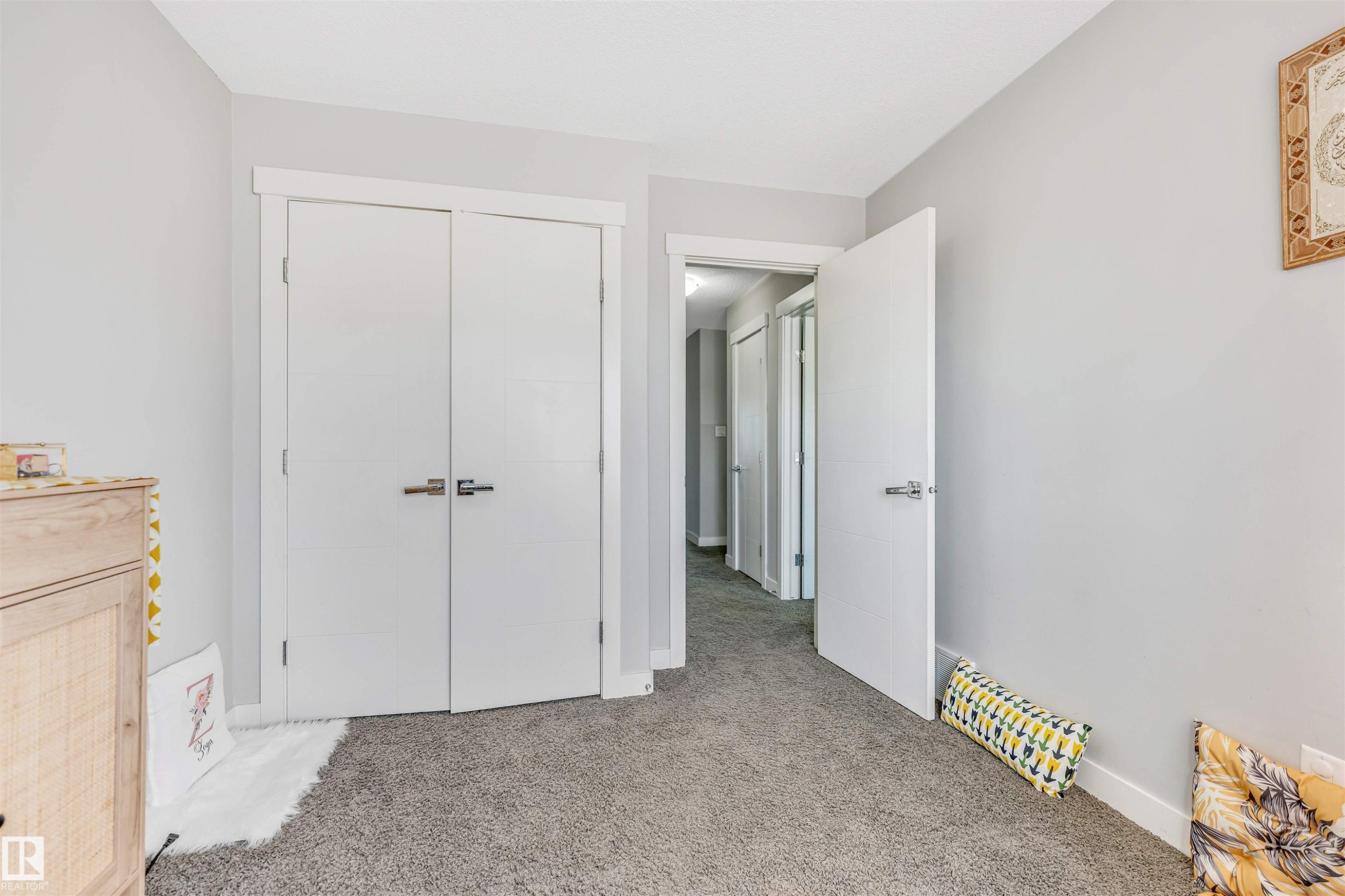 Unfurnished bedroom with carpet floors and a closet - 3478 Weidle Way, Edmonton, AB - Indoor Photo Showing Other Room