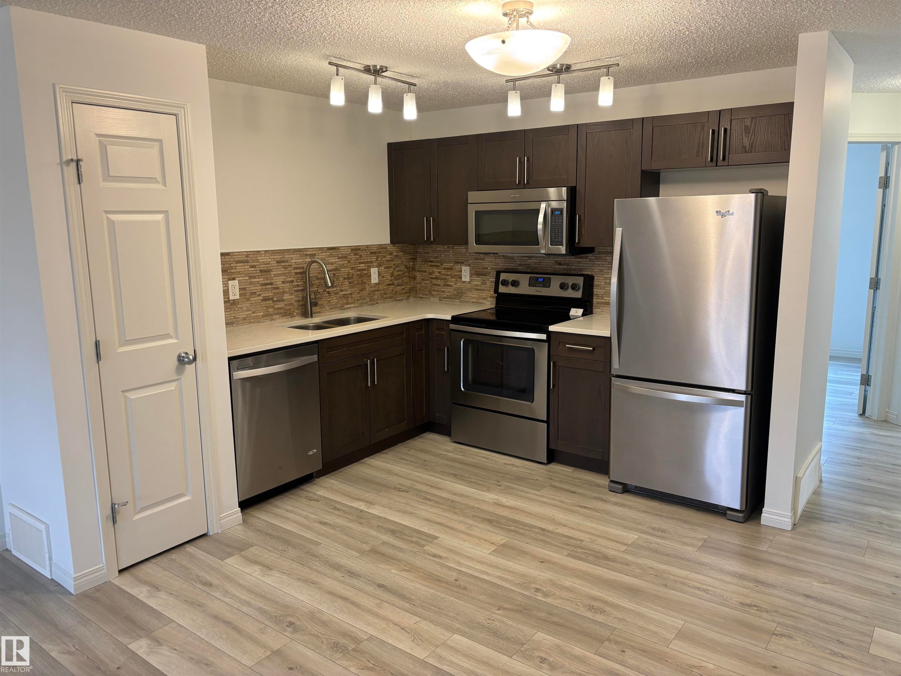 563 Orchards Boulevard, Edmonton, AB - Indoor Photo Showing Kitchen With Stainless Steel Kitchen With Double Sink