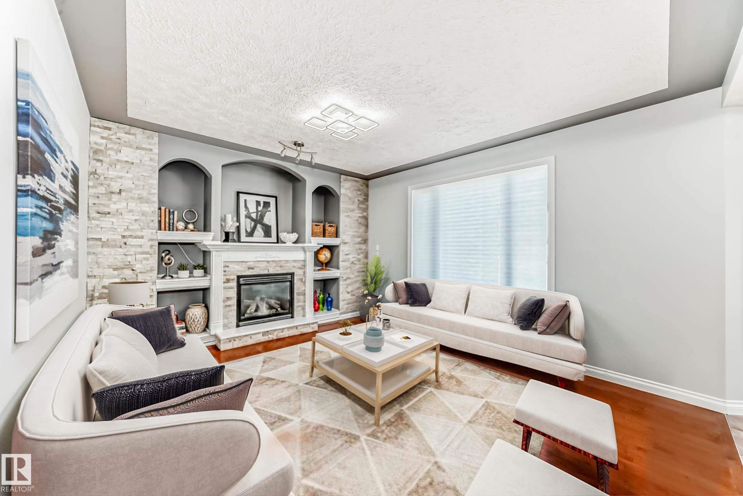 Edmonton, AB - Indoor Photo Showing Living Room With Fireplace