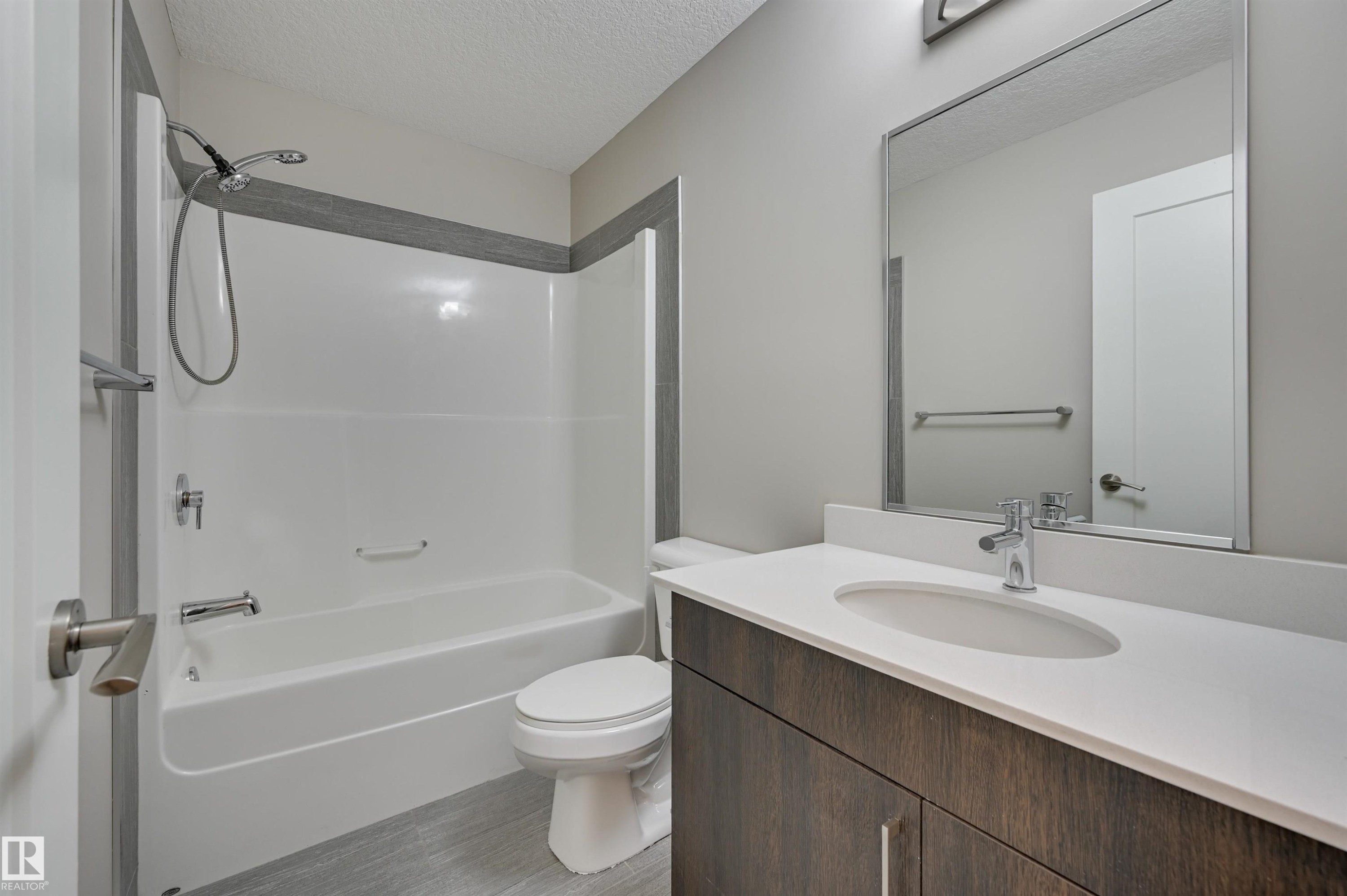 301 17 Columbia Avenue, Devon, AB - Indoor Photo Showing Bathroom