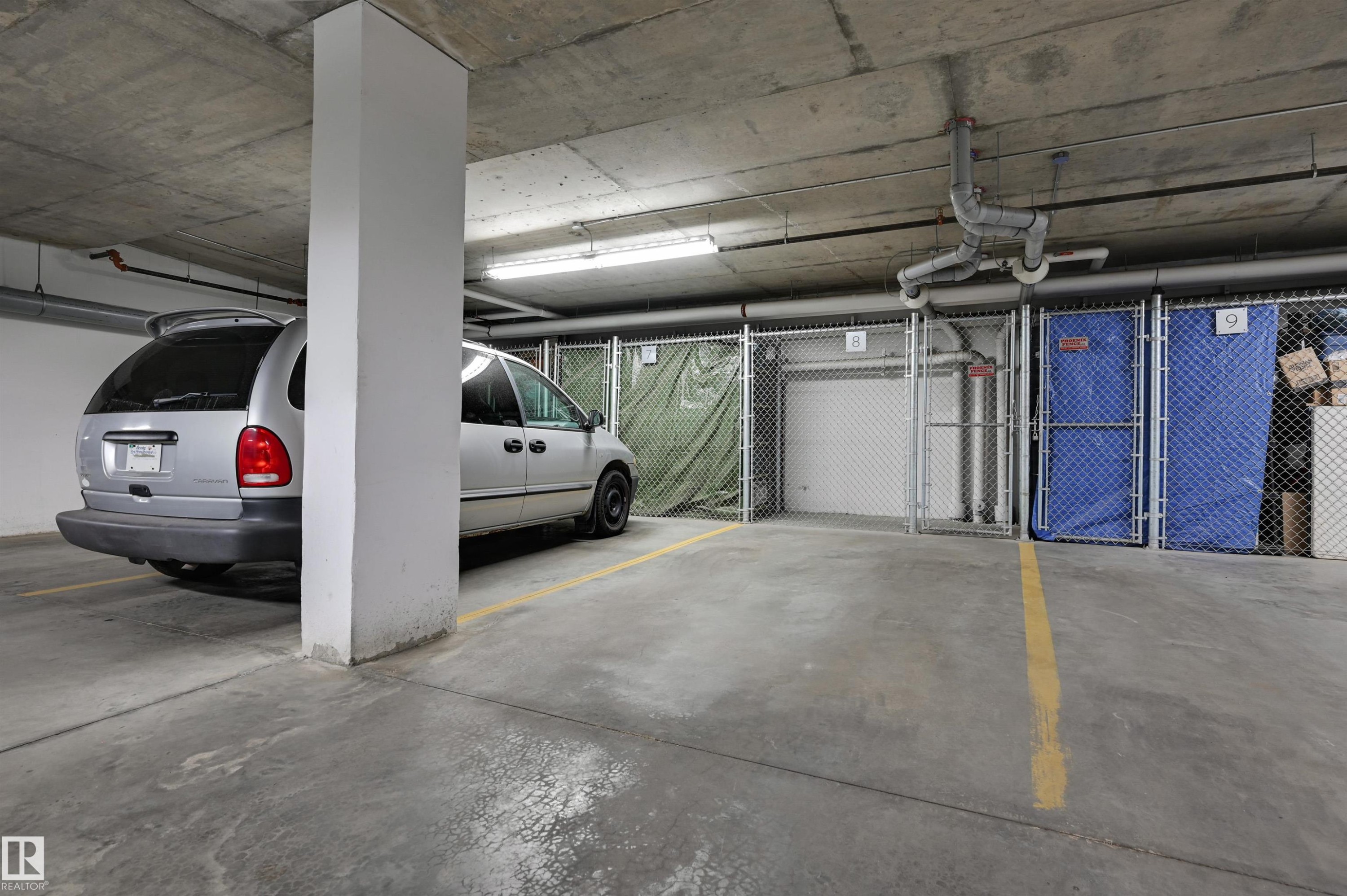 301 17 Columbia Avenue, Devon, AB - Indoor Photo Showing Garage