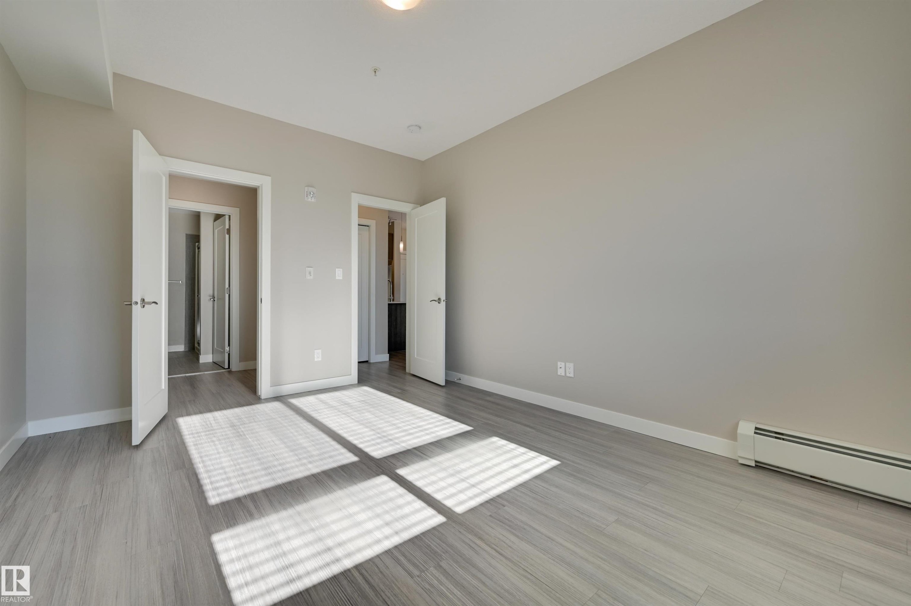 205 17 Columbia Avenue, Devon, AB - Indoor Photo Showing Other Room