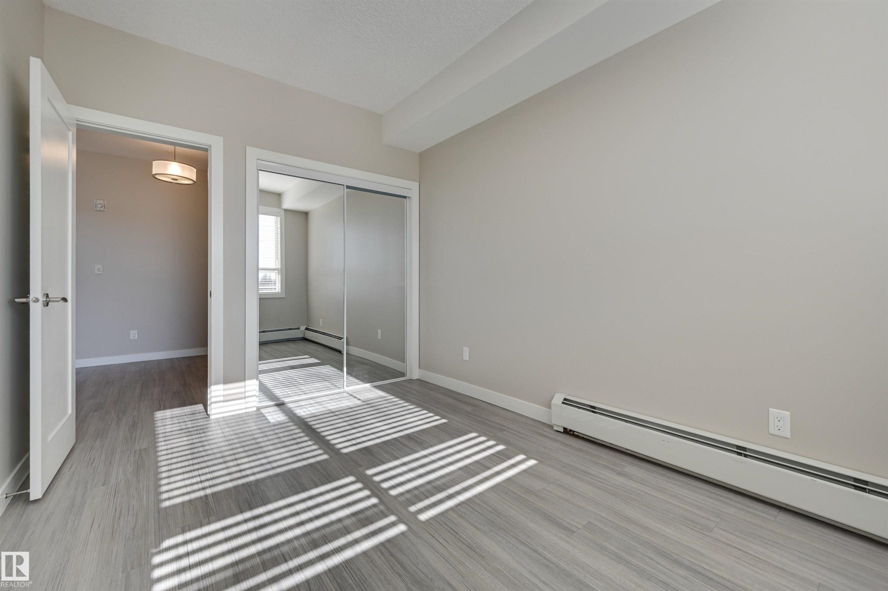 205 17 Columbia Avenue, Devon, AB - Indoor Photo Showing Other Room