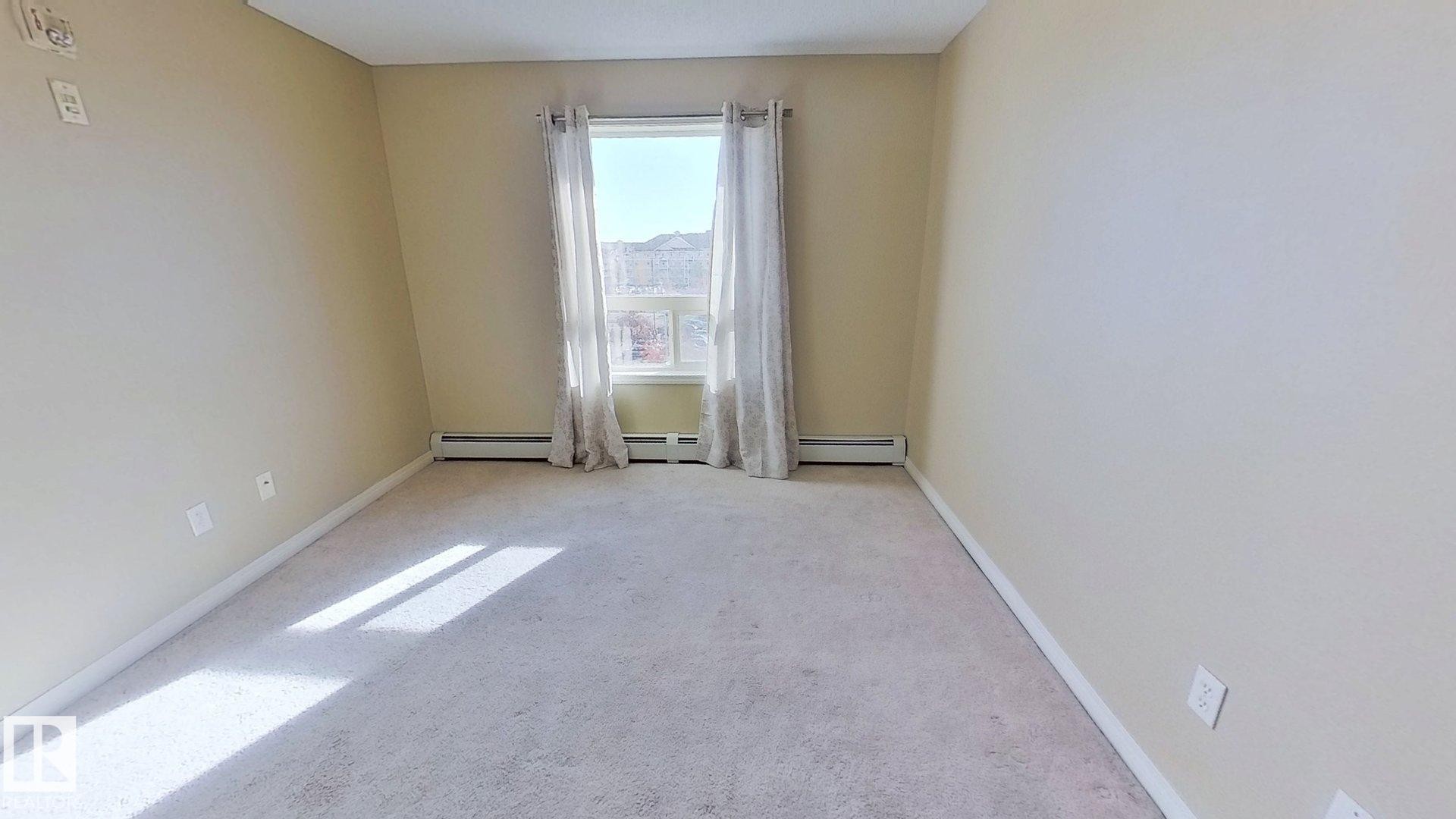 1423 330 Clareview Station Drive, Edmonton, AB - Indoor Photo Showing Other Room