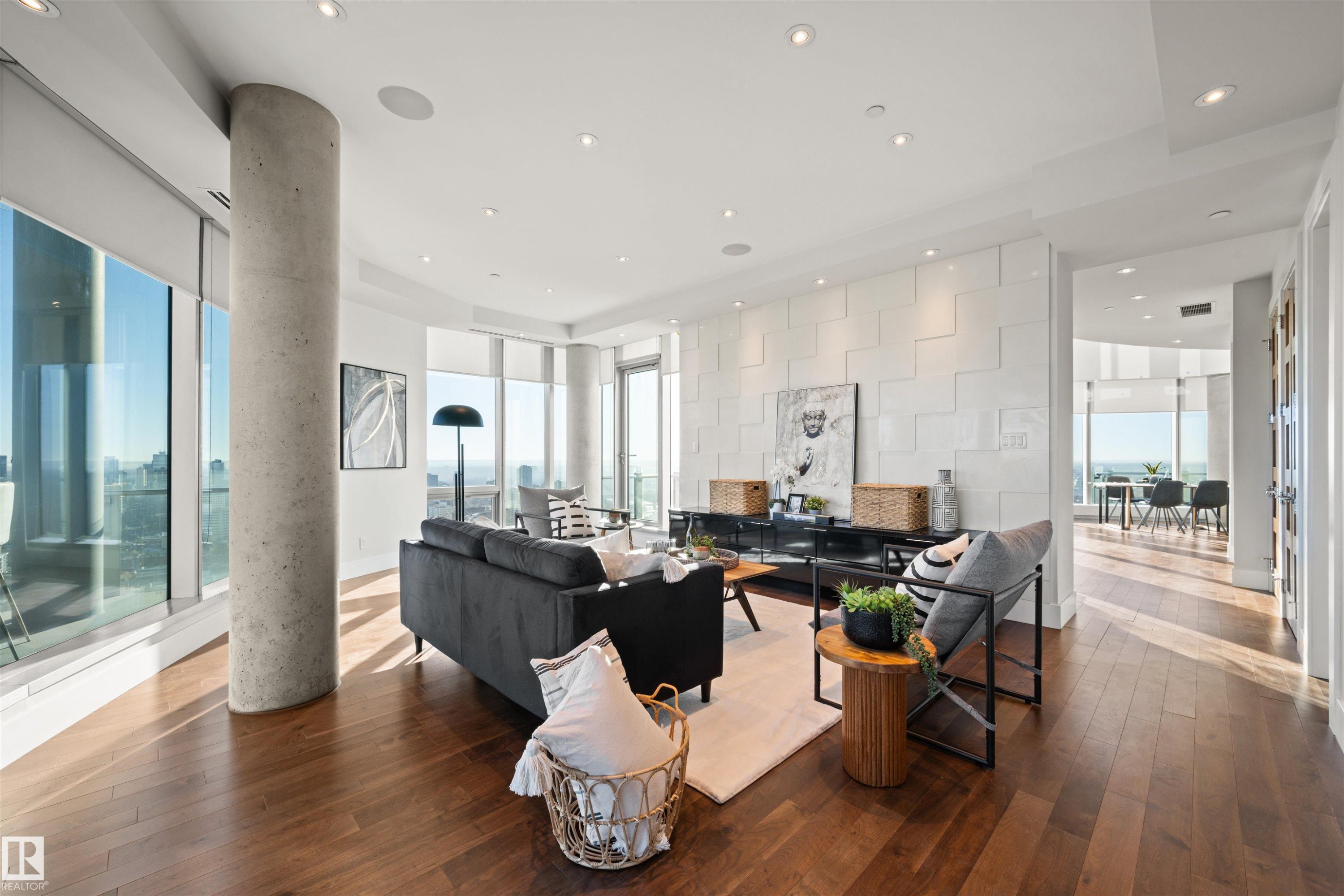 Living area featuring recessed lighting, wood-type flooring, and floor to ceiling windows - 3201 11969 Jasper Avenue, Edmonton, AB - Indoor