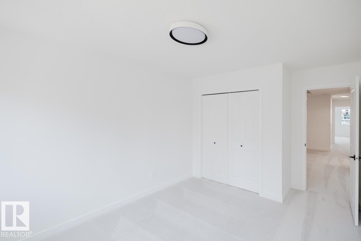 8219 Kiriak Loop, Edmonton, AB - Indoor Photo Showing Other Room