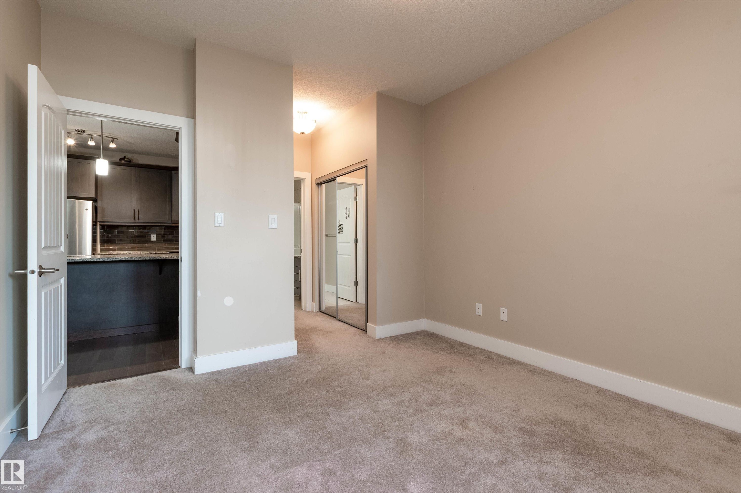 140 6079 Maynard Way, Edmonton, AB - Indoor Photo Showing Other Room