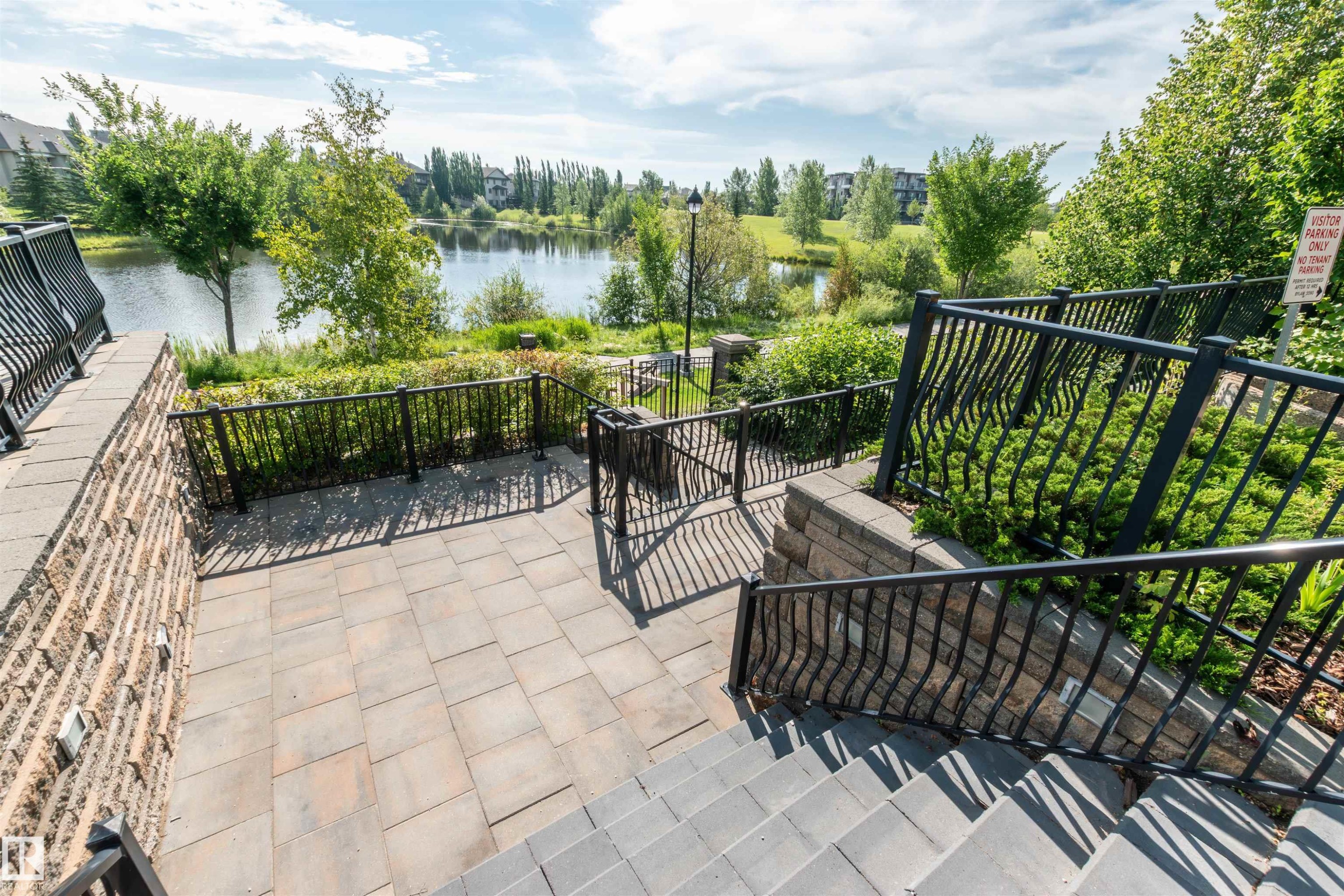 View of patio / terrace featuring a water view - 140 6079 Maynard Way, Edmonton, AB - Outdoor