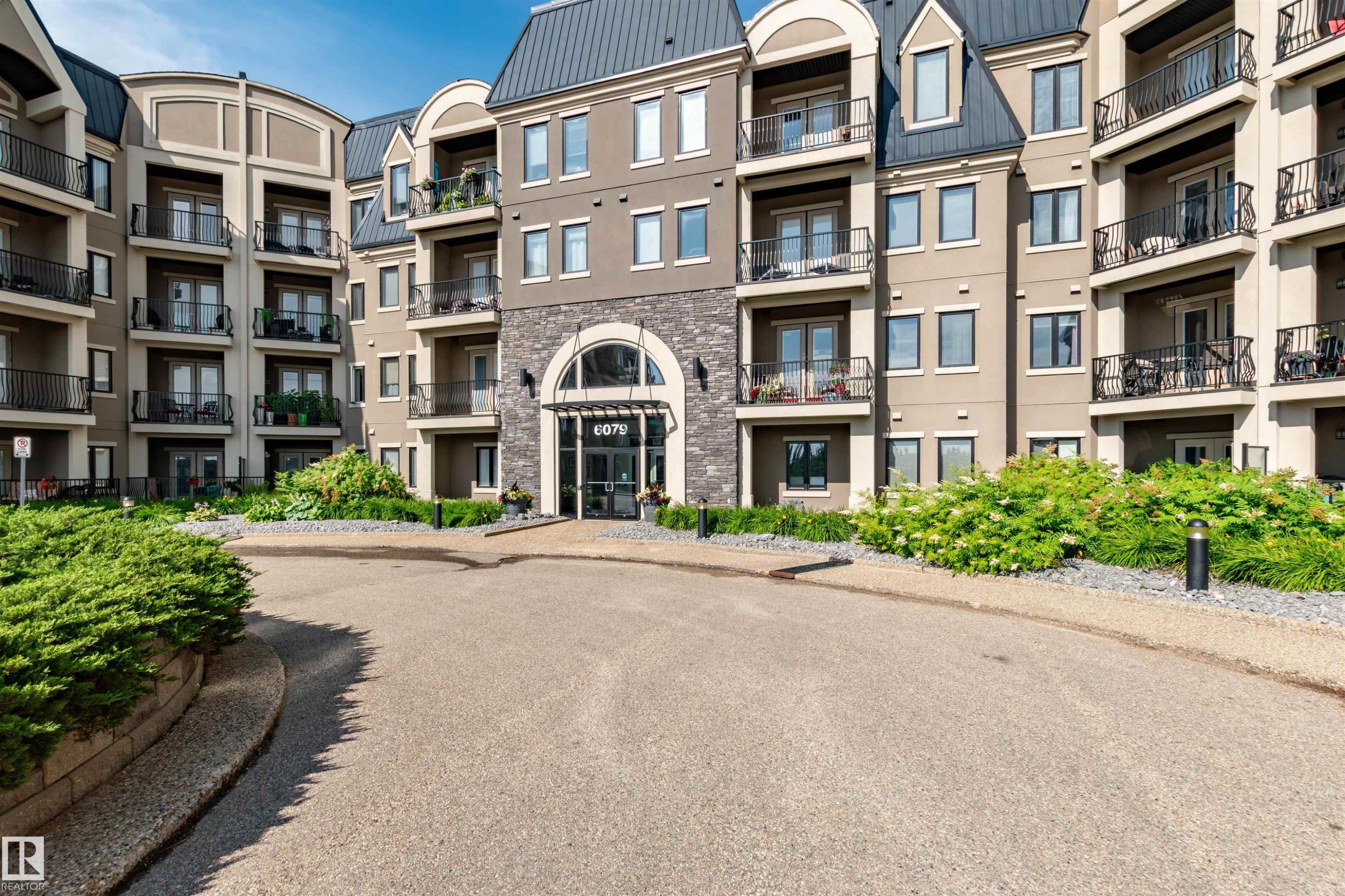 140 6079 Maynard Way, Edmonton, AB - Outdoor With Facade