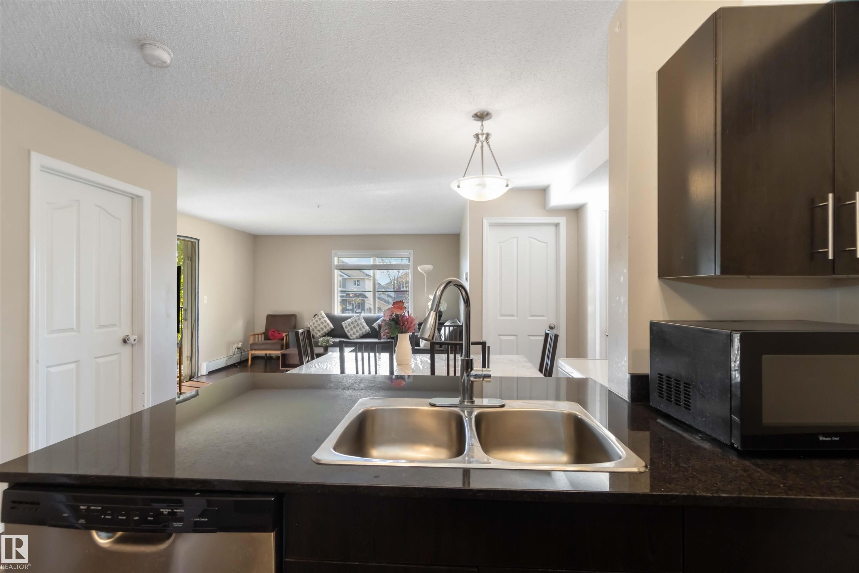 210 530 Watt Boulevard, Edmonton, AB - Indoor Photo Showing Kitchen With Double Sink