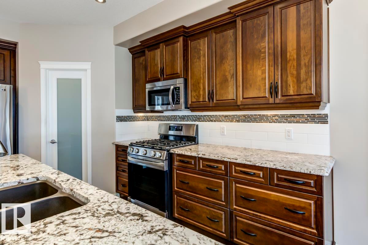 11122 52 Street, Edmonton, AB - Indoor Photo Showing Kitchen With Double Sink