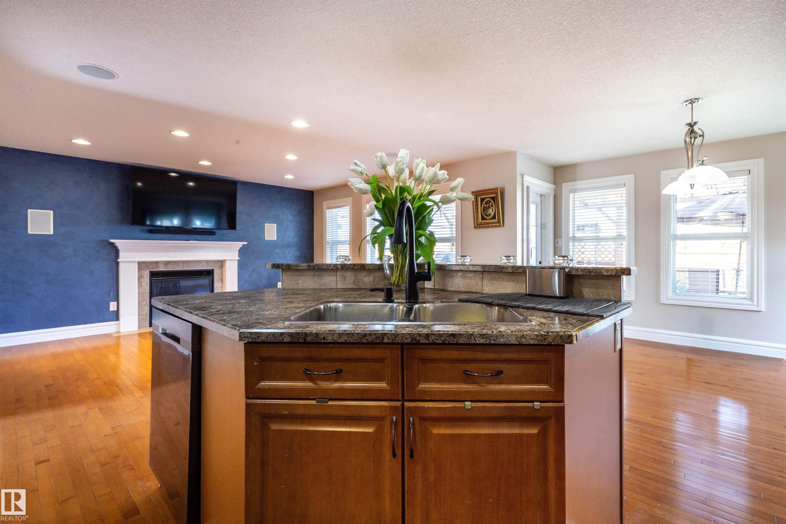 4224 157 Av, Edmonton, AB - Indoor Photo Showing Kitchen With Fireplace With Double Sink